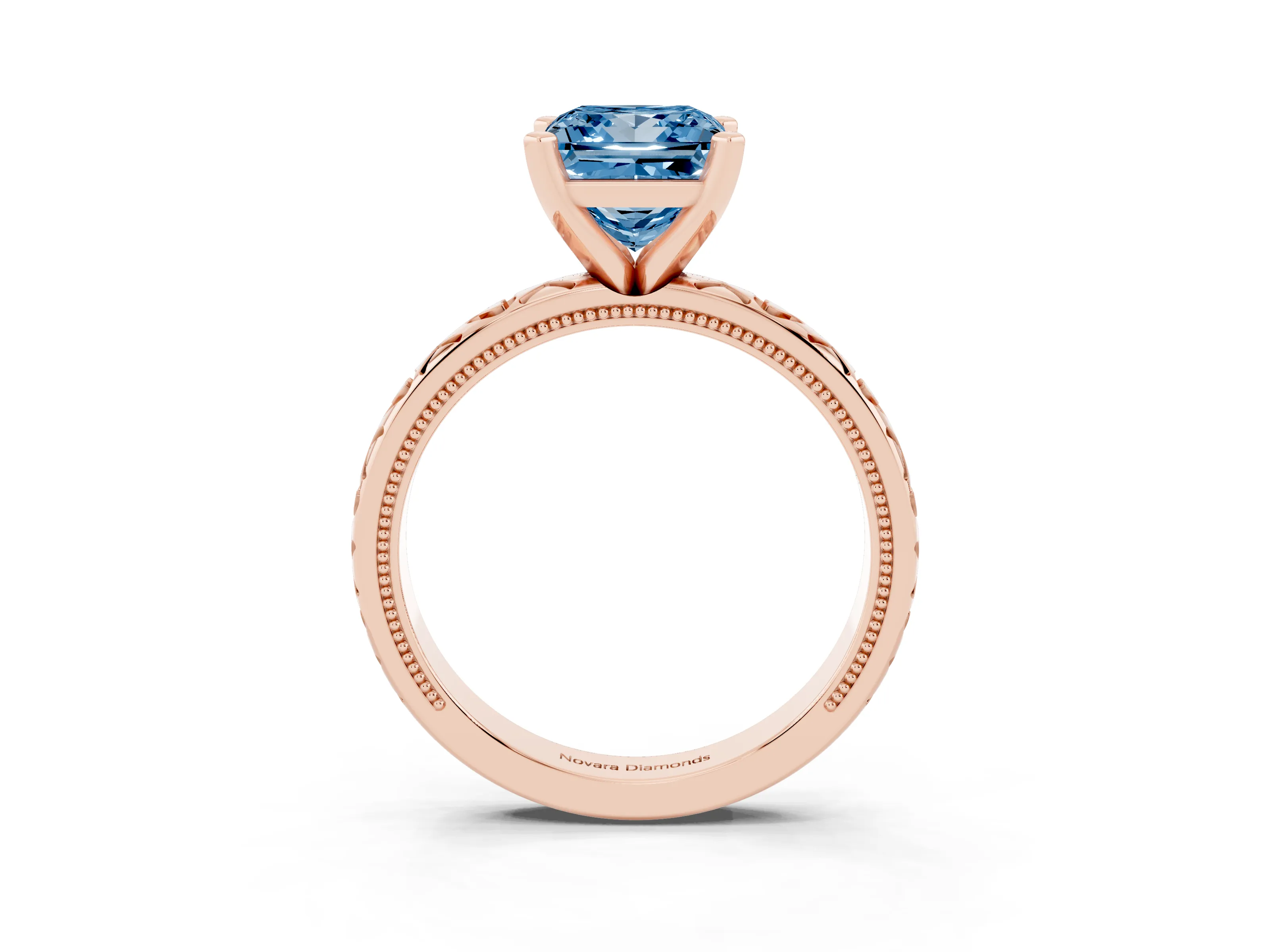 Fancy Blue Princess Cut Diamond Solitaire Engagement Ring Set in Rose gold with XO Engraved Band and Prong Setting