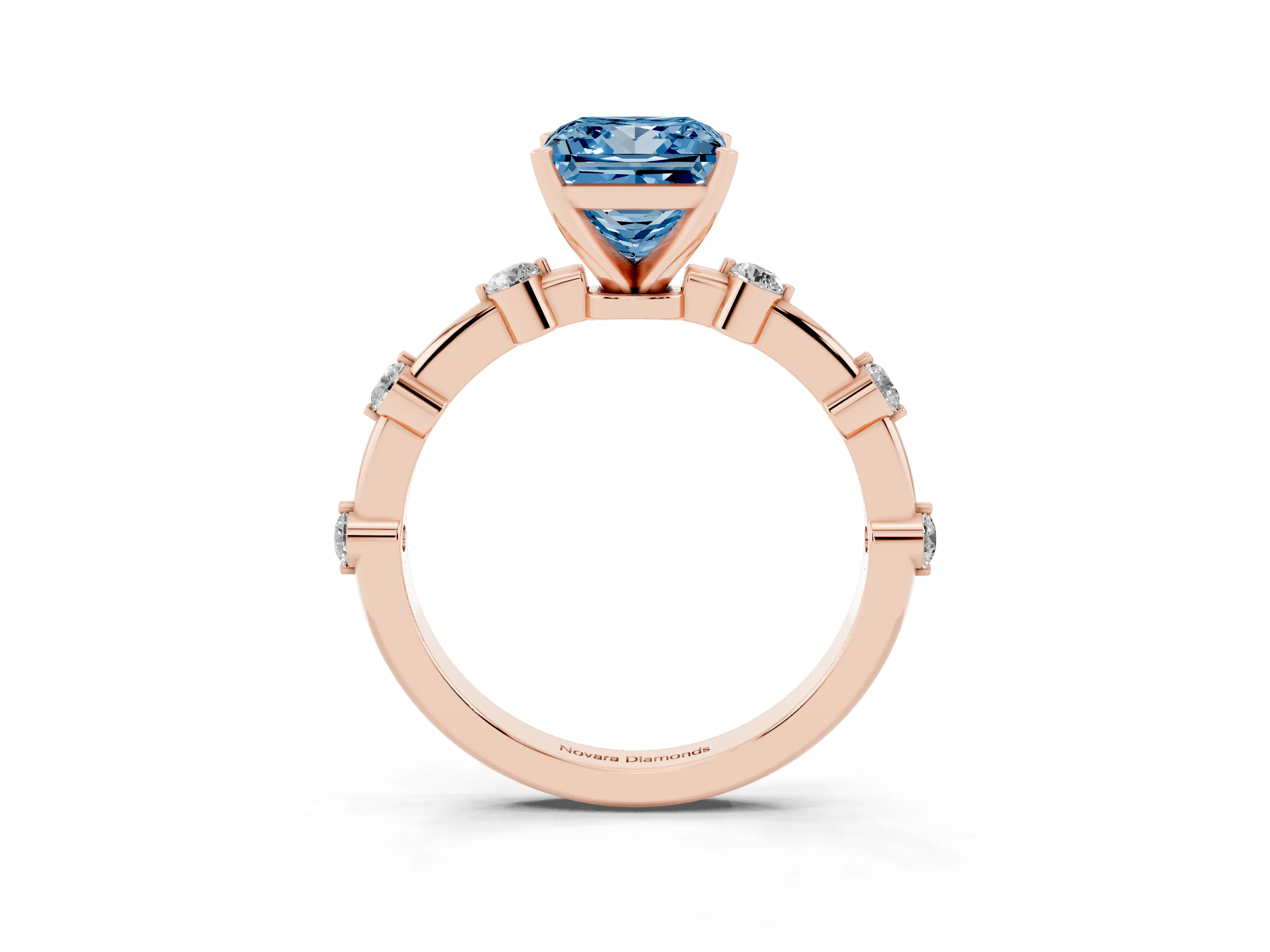 Fancy Blue Princess Cut Diamond Solitaire Ring Set in Rose gold with Bezel Set Side Stones and Prong Setting