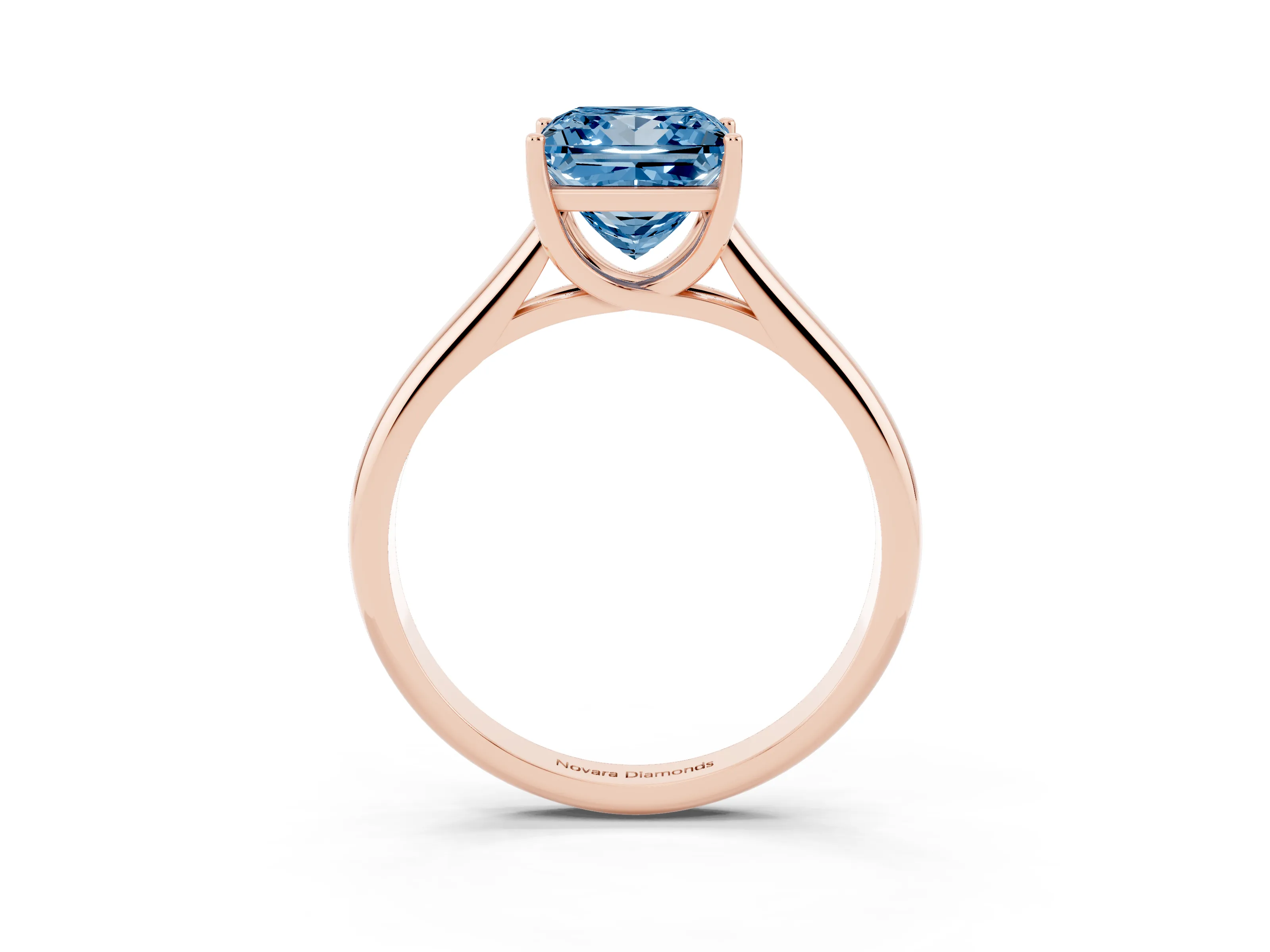 Fancy Blue Princess Cut Diamond Solitaire Engagement Ring Set in Rose gold with Subtly Tapered Band and Prong Setting