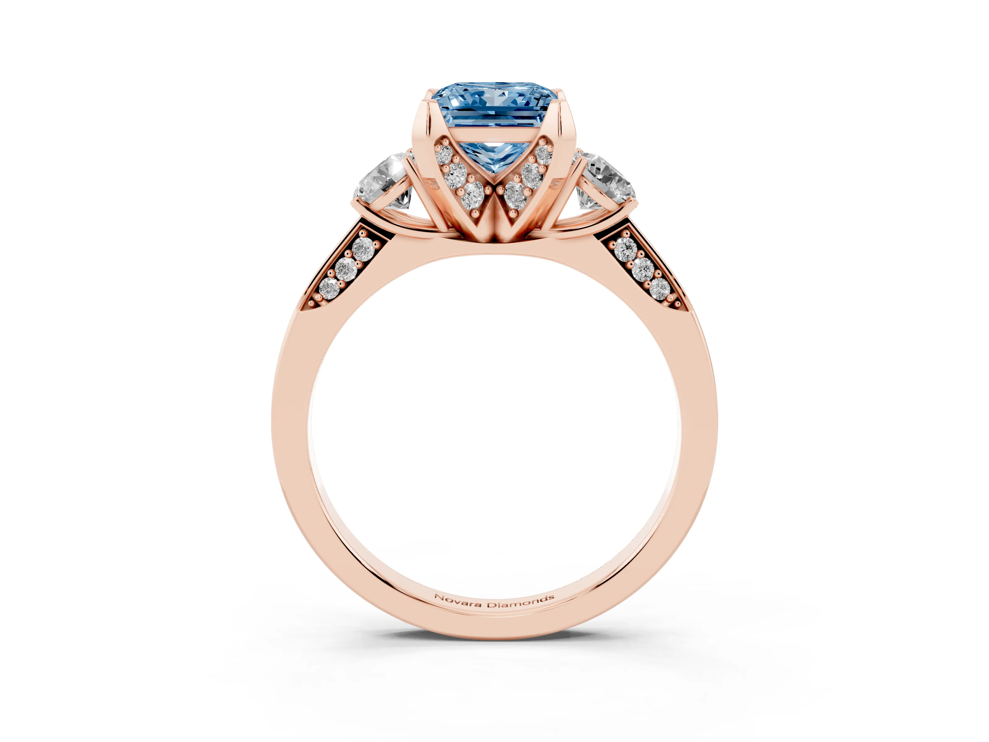 Fancy Blue Princess Cut Diamond Three-Stone Ring Set in Rose gold with Pavé Band and Smaller Side Stones