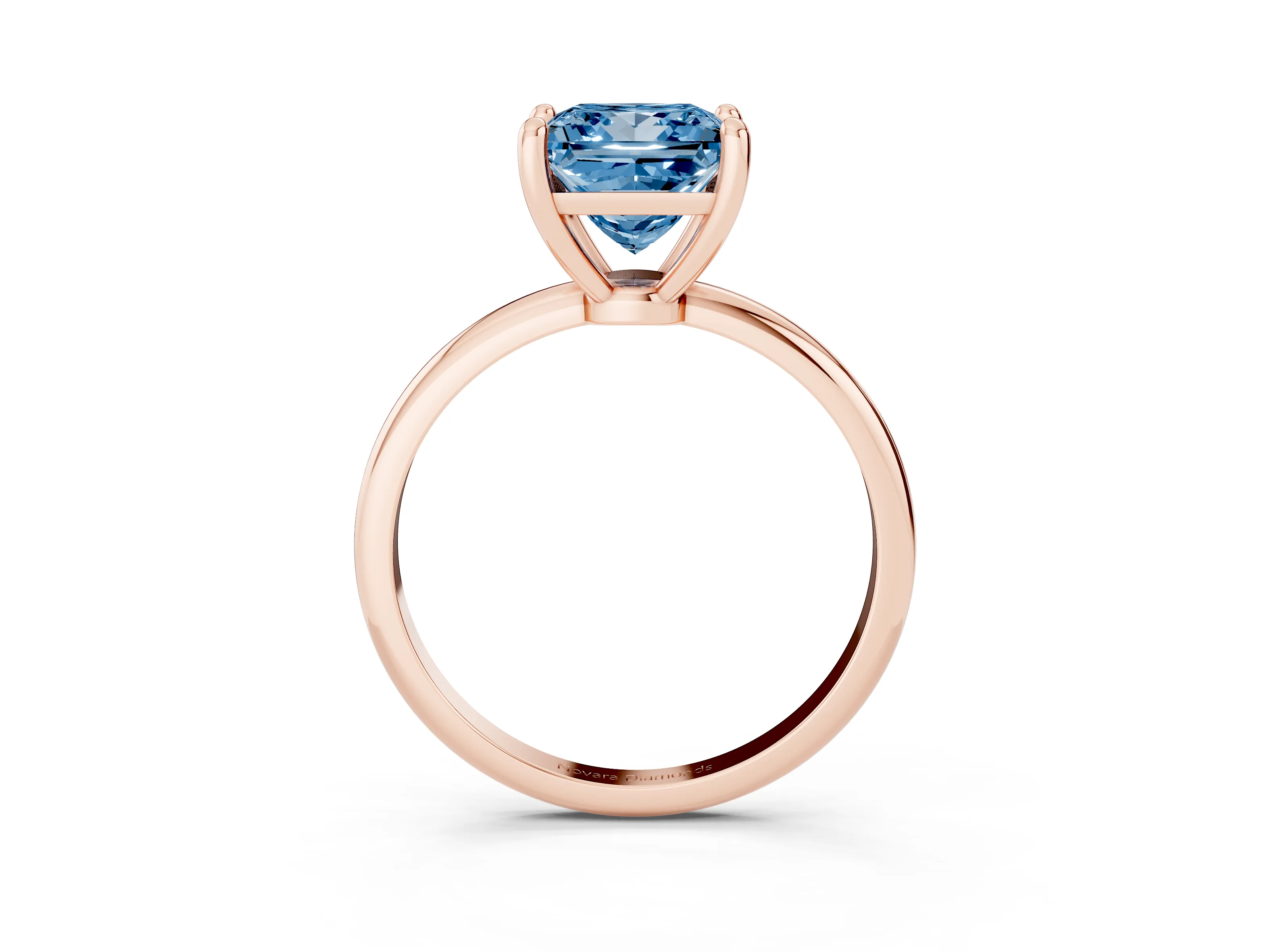 Fancy Blue Princess Cut Diamond Solitaire Ring Set in Rose gold with Secure Prong Setting on a Classic Band