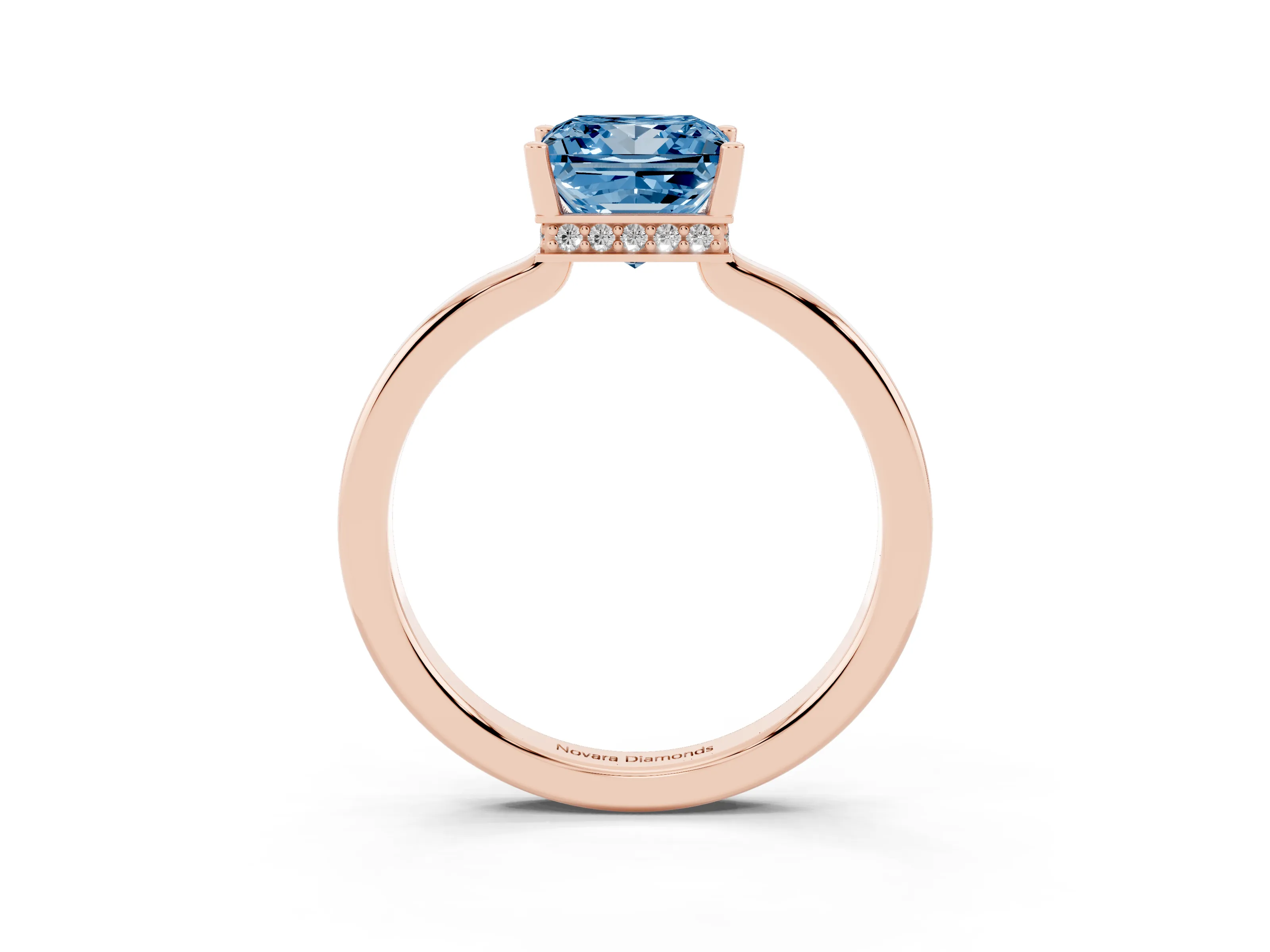 Fancy Blue Princess Cut Diamond Solitaire Engagement Ring Set in Rose gold with Prong Setting on a Plain Band