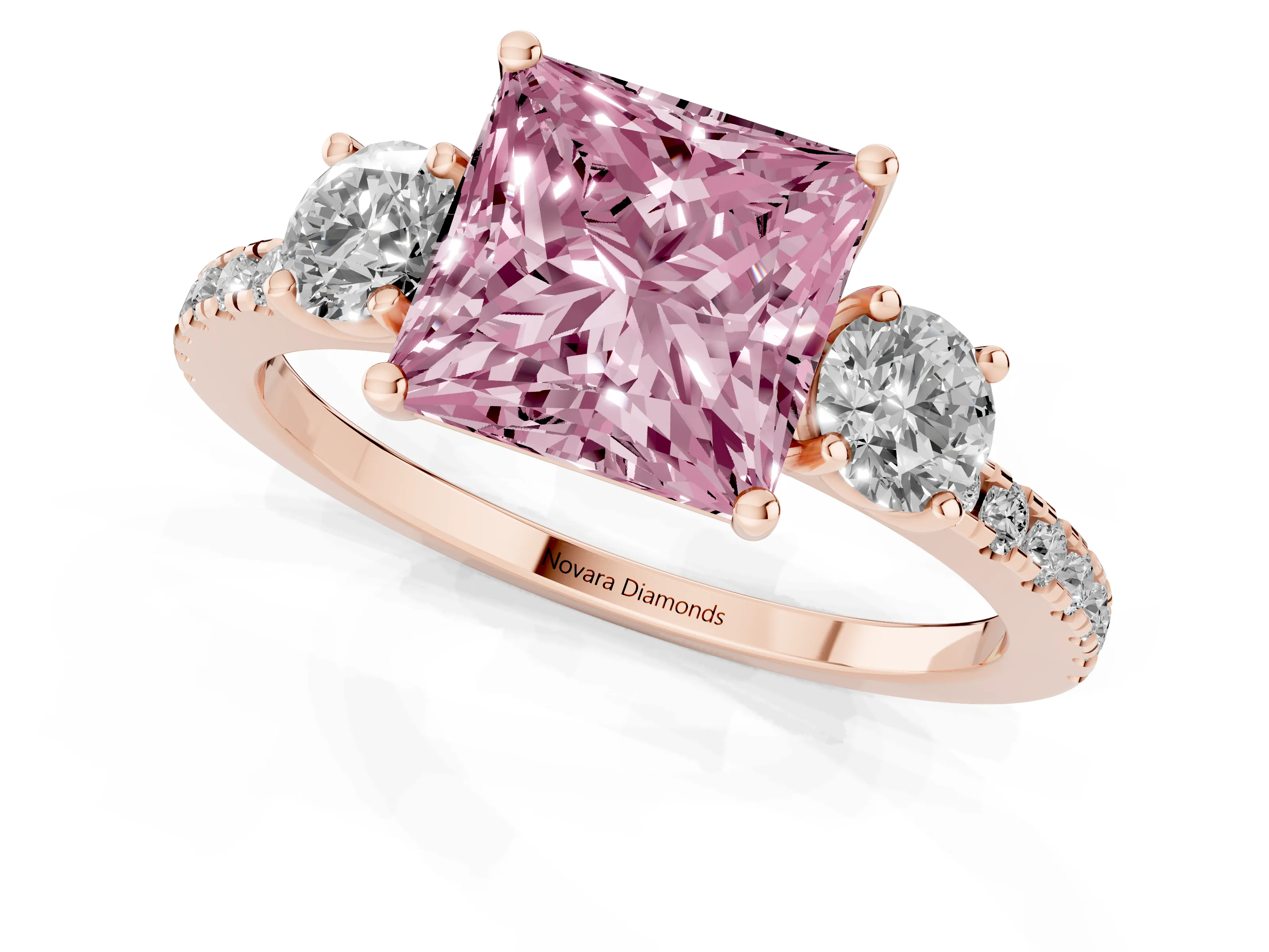 Fancy Pink Princess Cut Diamond Three-Stone Ring Set in Rose gold with Pavé Band and Graduated Sides