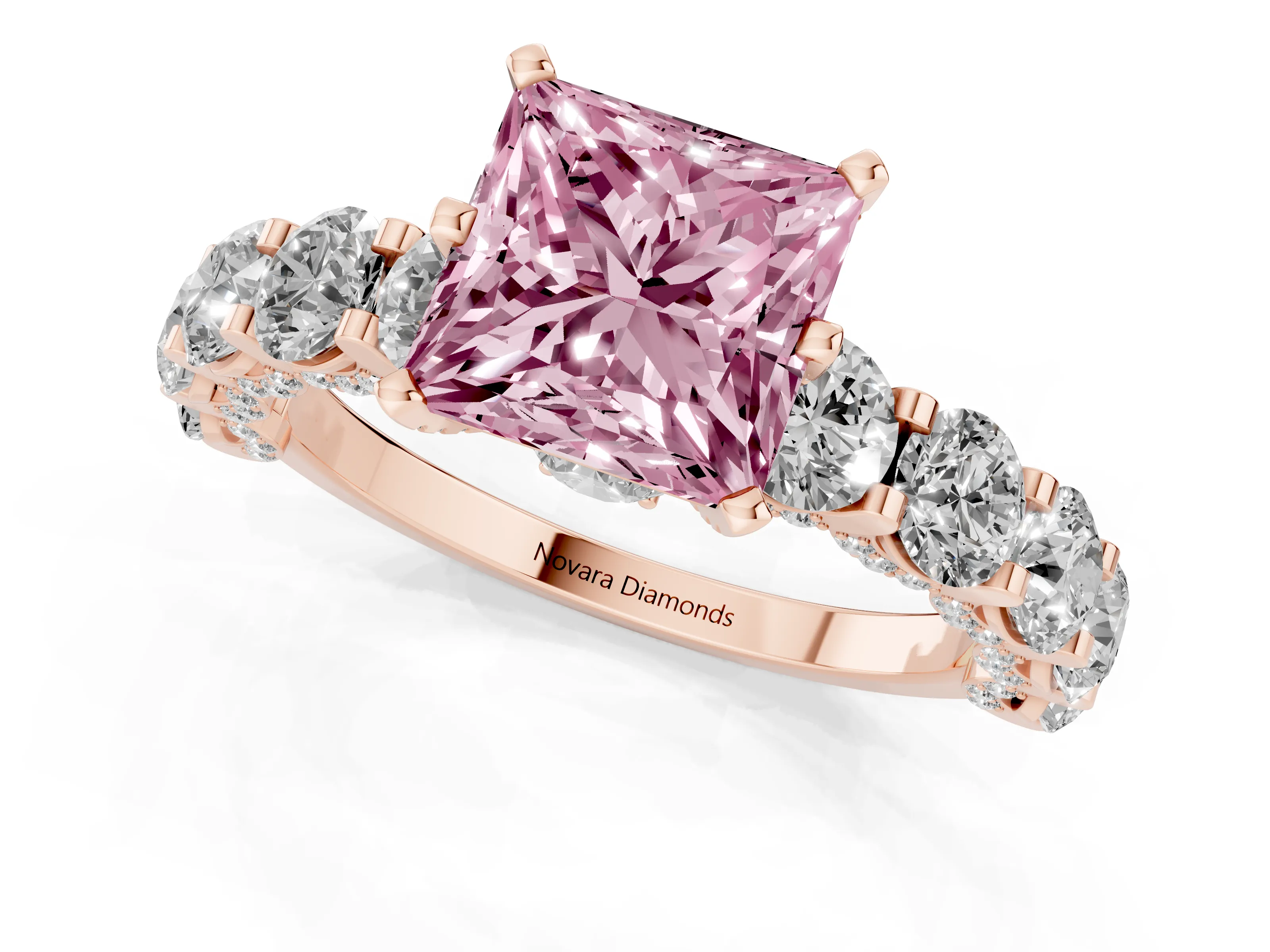 Fancy Pink Princess Cut Diamond Side Stone Ring Set in Rose gold with Alternating Round and Oval Side Stones