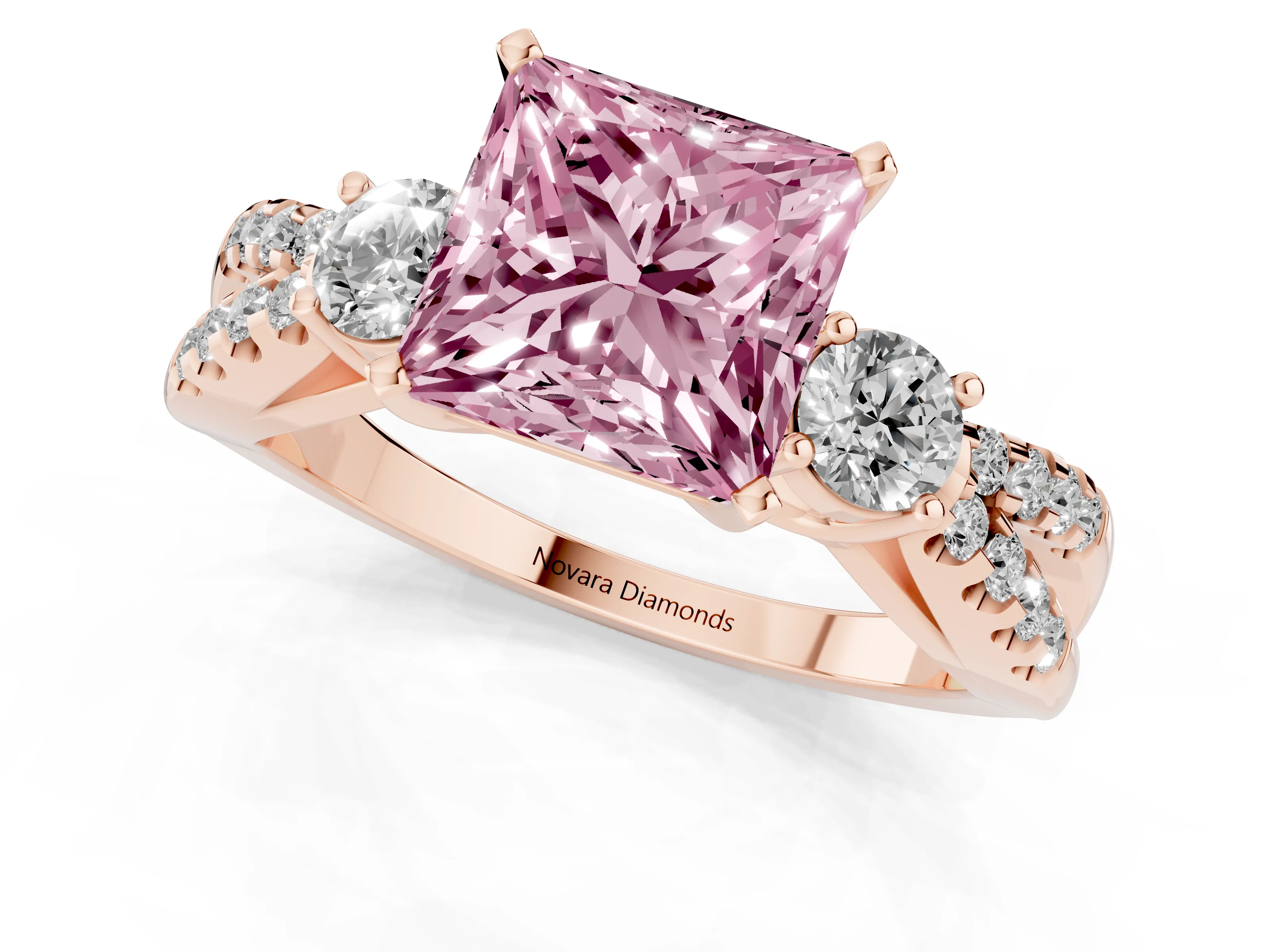 Fancy Pink Princess Cut Diamond Three-Stone Ring Set in Rose gold with Pavé Split Shank and Prong Setting