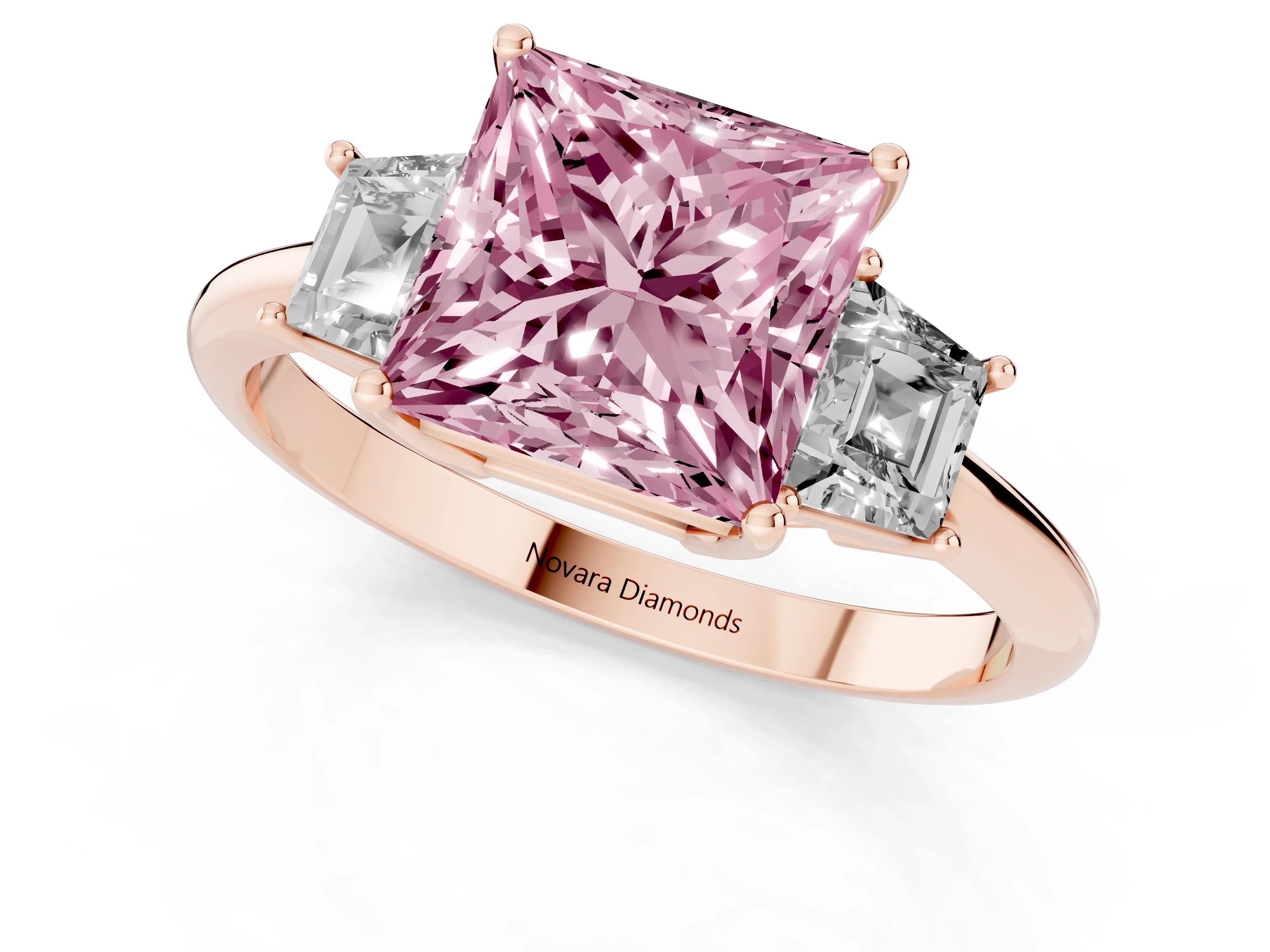 Fancy Pink Princess Cut Diamond Three-Stone Ring Set in Rose gold with Trapezoid Side Stones and Prong Setting