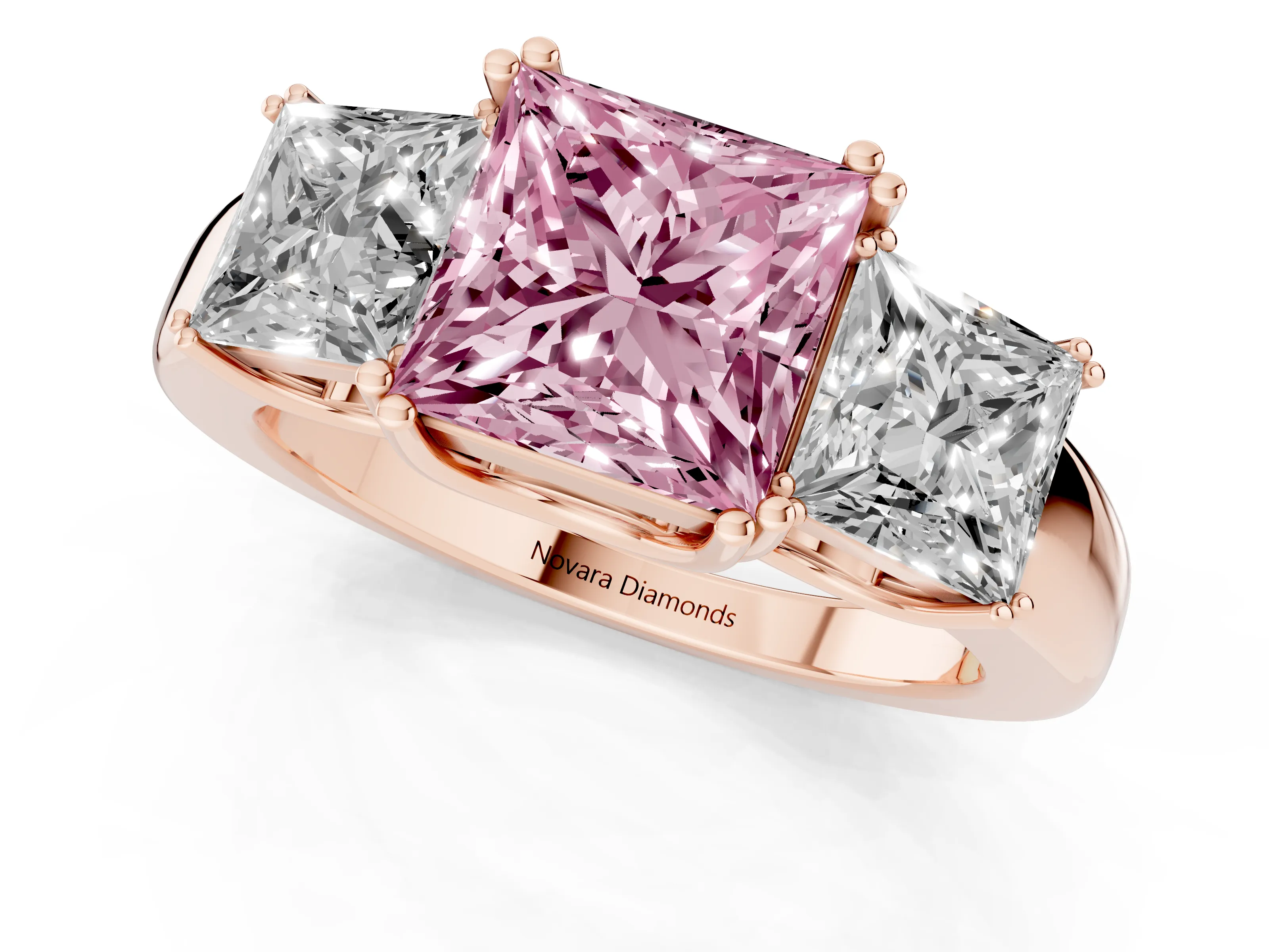 Fancy Pink Princess Cut Diamond Three-Stone Ring Set in Rose gold with Polished Channel-Set Band