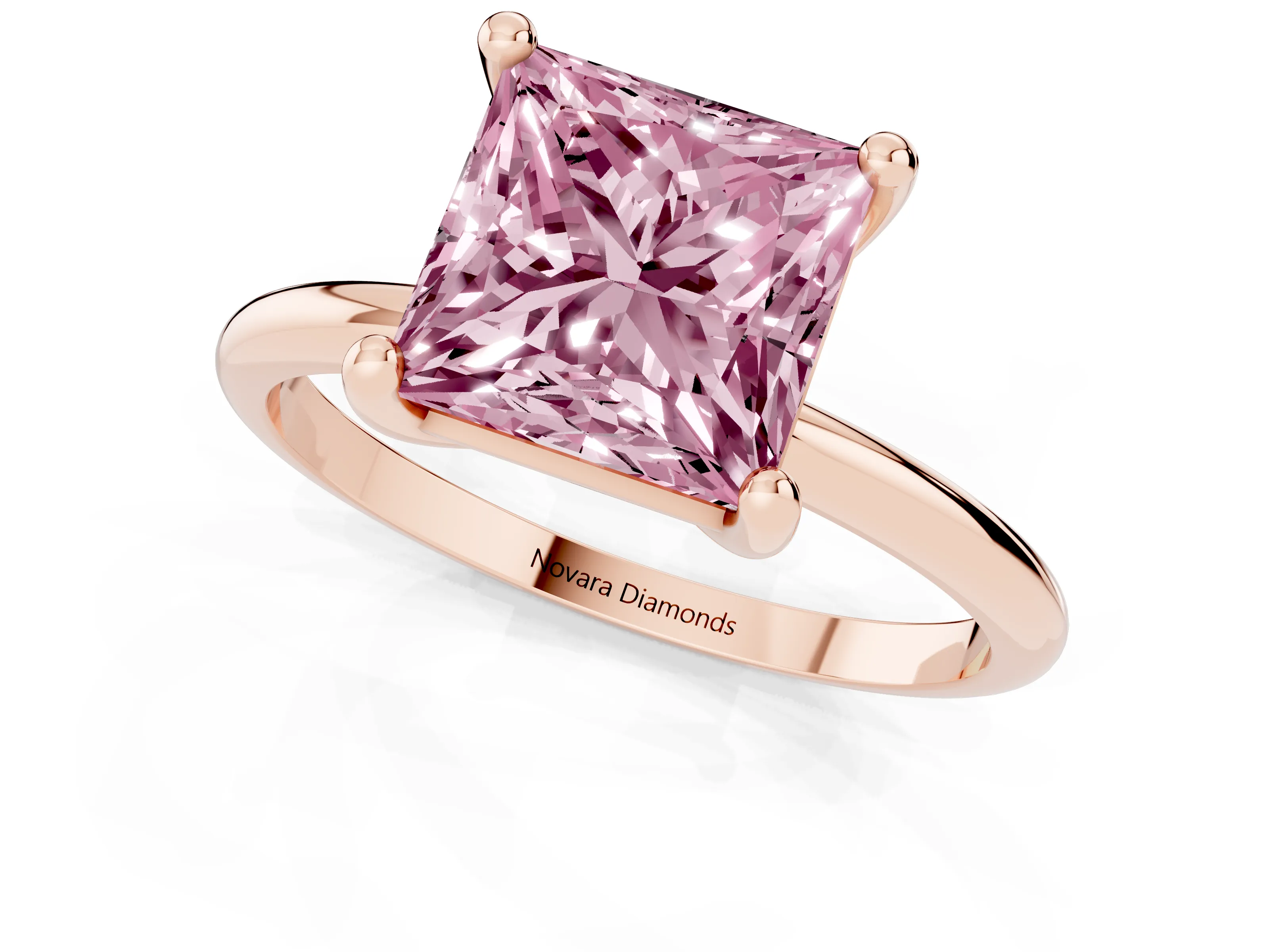 Fancy Pink Princess Cut Diamond Solitaire Ring Set in Rose gold with Secure Prong Setting on a Classic Band