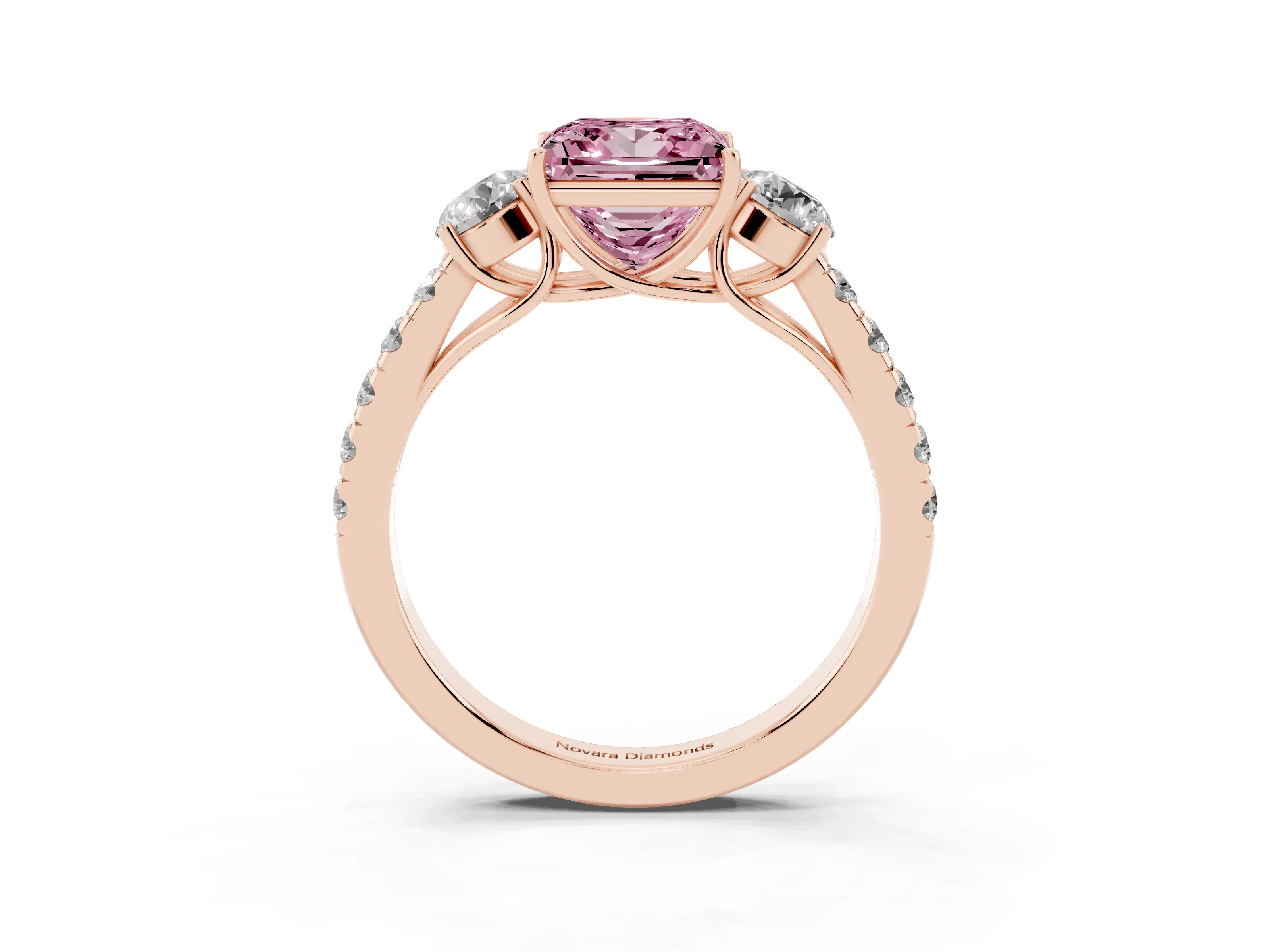 Fancy Pink Princess Cut Diamond Three-Stone Ring Set in Rose gold with Round Side Stones and Delicate Pavé Band
