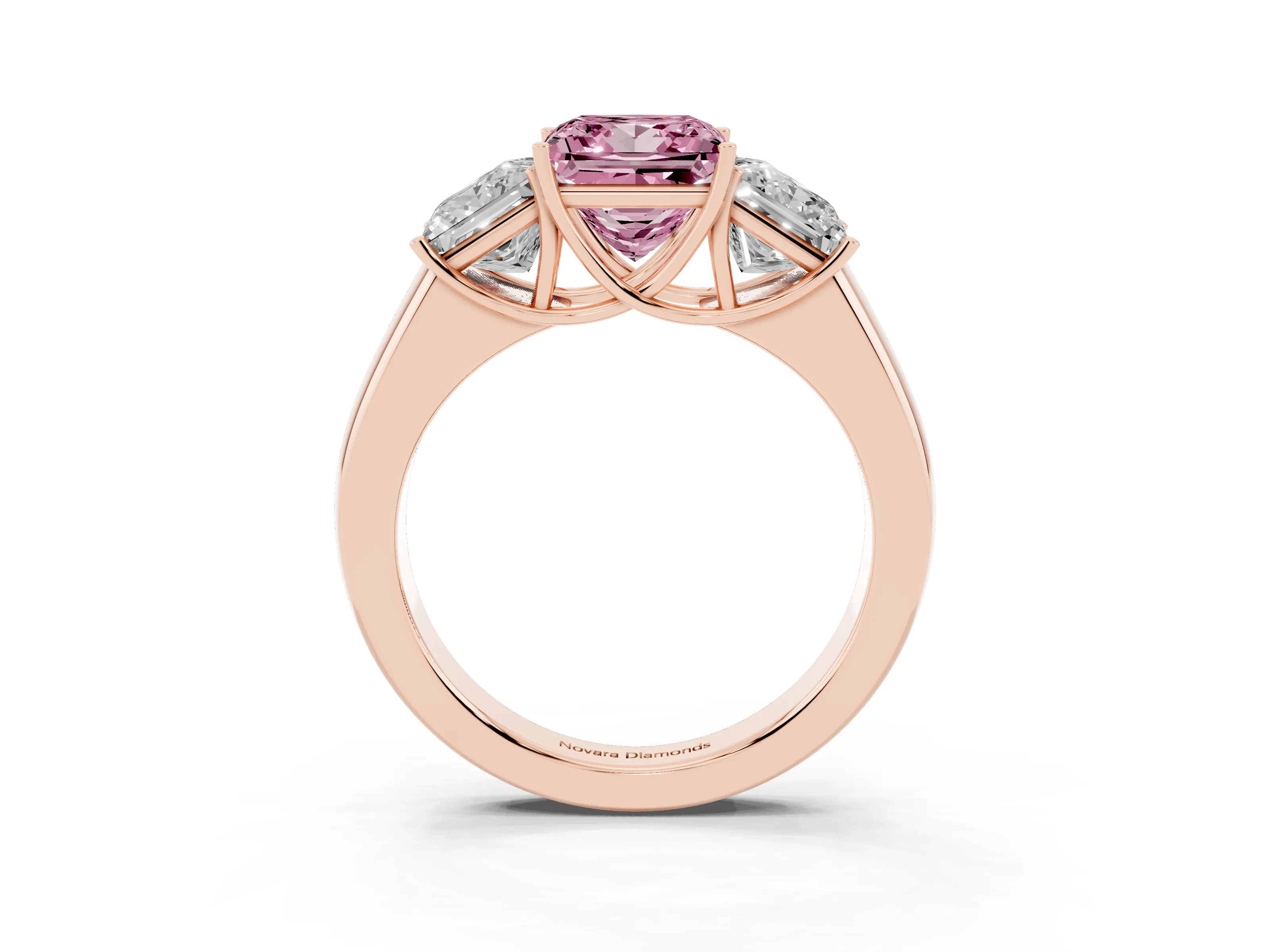 Fancy Pink Three-Stone Princess Cut Diamond Ring Set in Rose gold with Matching Prong Settings and Plain Band