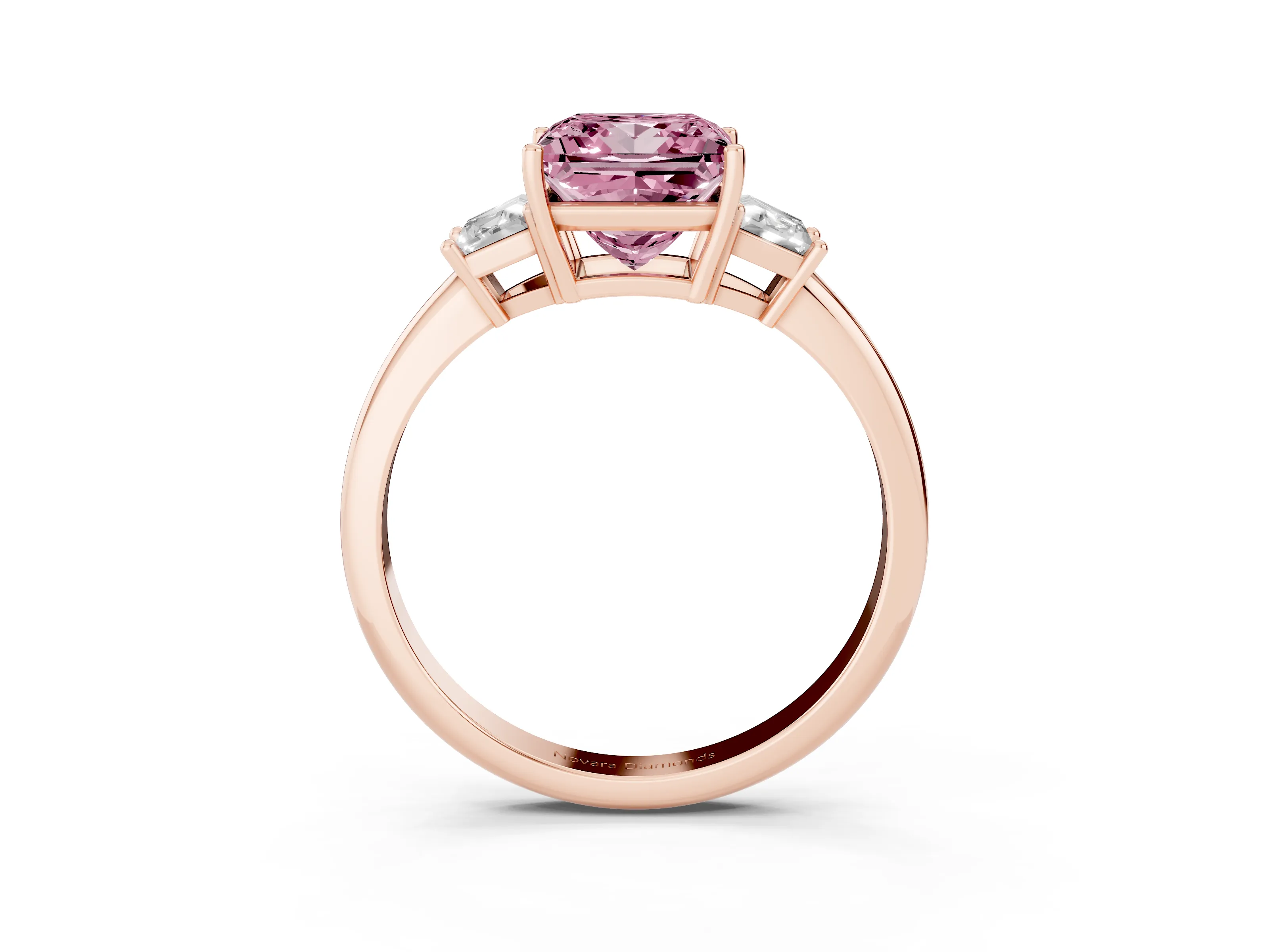 Fancy Pink Princess Cut Diamond Three-Stone Ring Set in Rose gold with Trapezoid Side Stones and Prong Setting