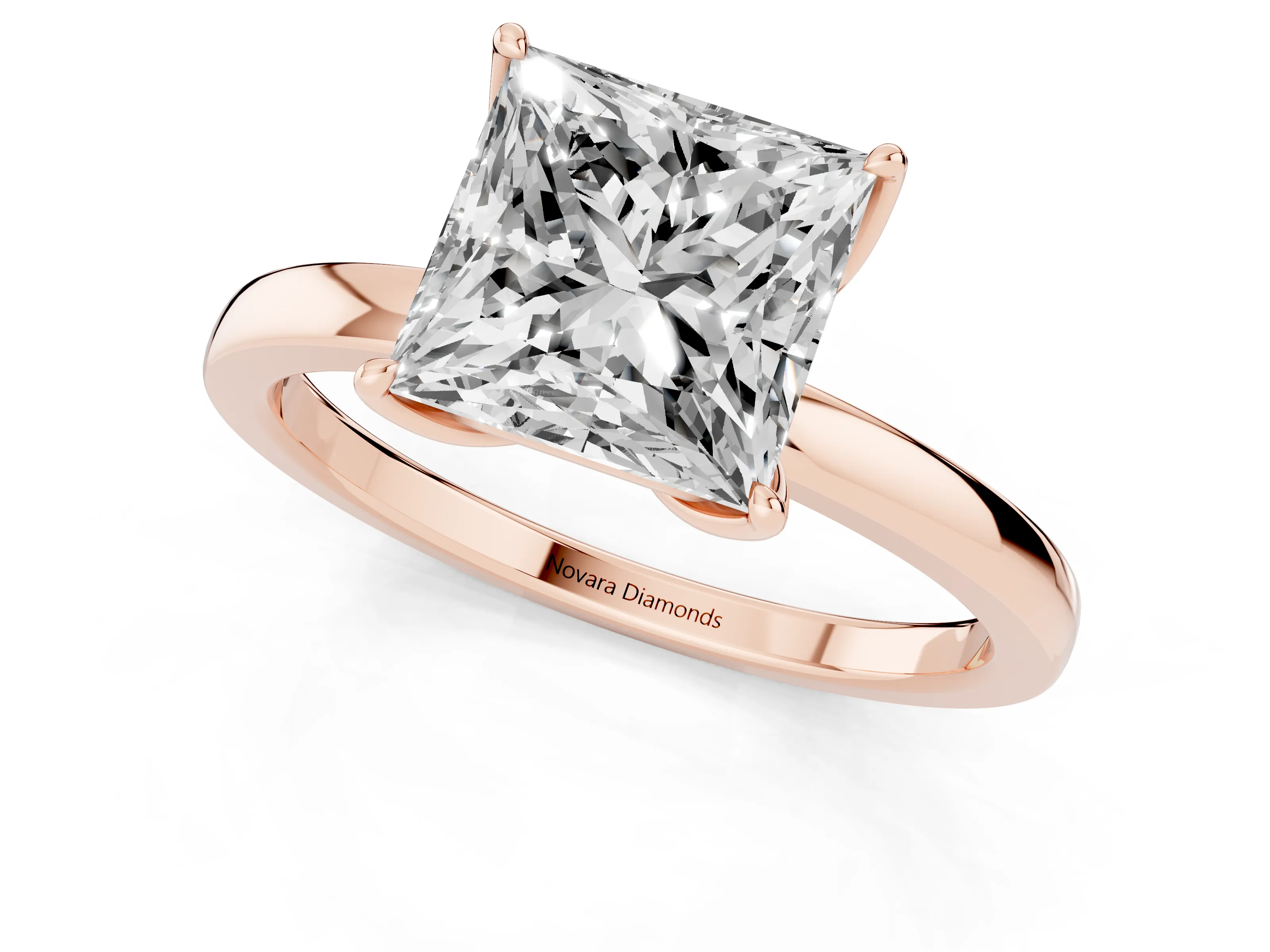 Princess Cut Diamond Solitaire Ring Set in Rose gold with Prong Setting and Thin Polished Band
