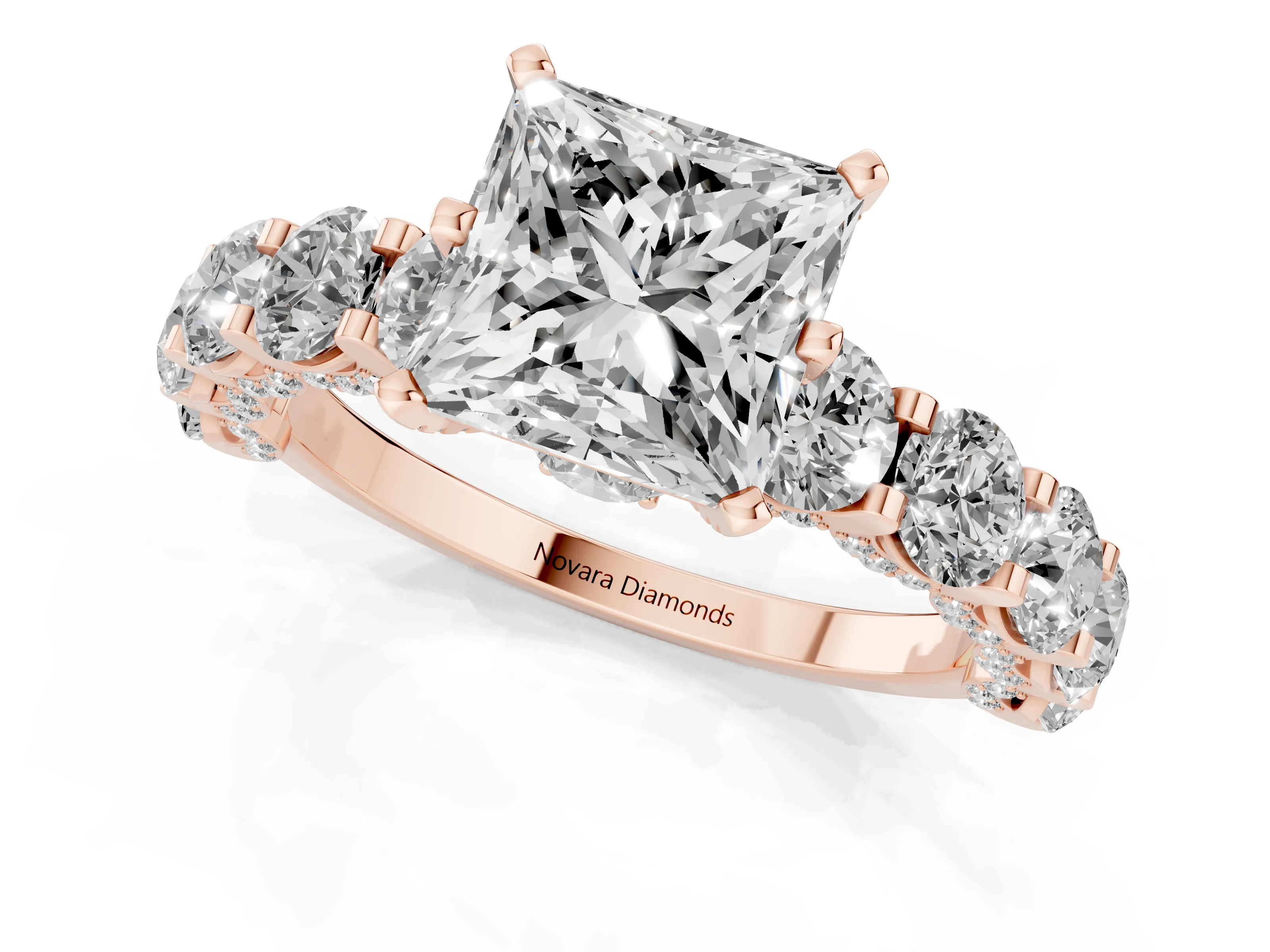 Princess Cut Diamond Side Stone Ring Set in Rose gold with Alternating Round and Oval Side Stones