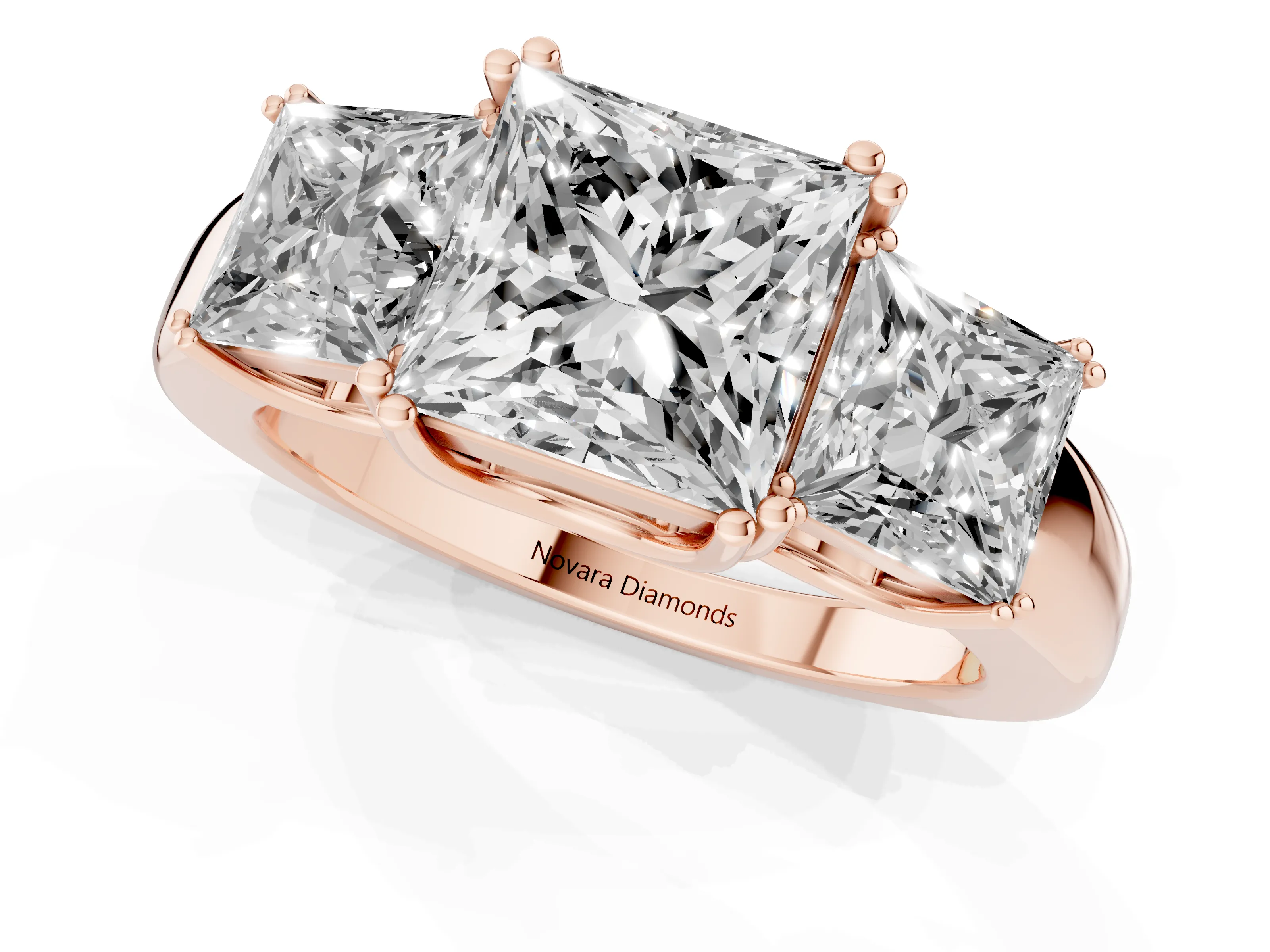 Princess Cut Diamond Three-Stone Ring Set in Rose gold with Polished Channel-Set Band
