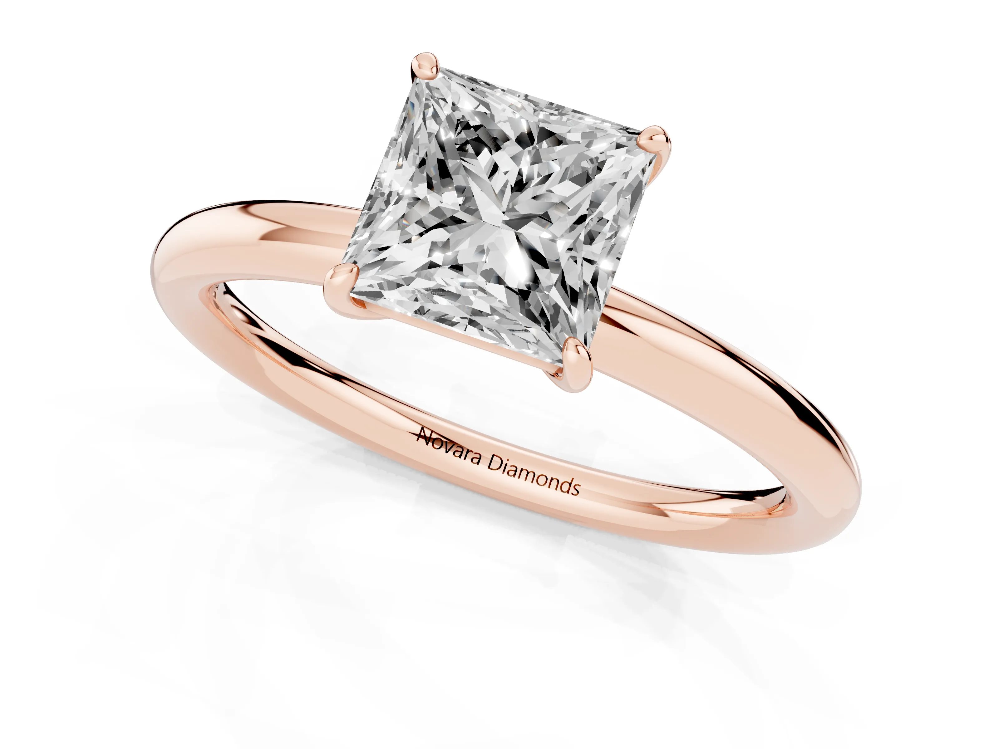 Princess Cut Diamond Solitaire Ring Set in Rose gold with Prong Setting on a Polished Plain Band