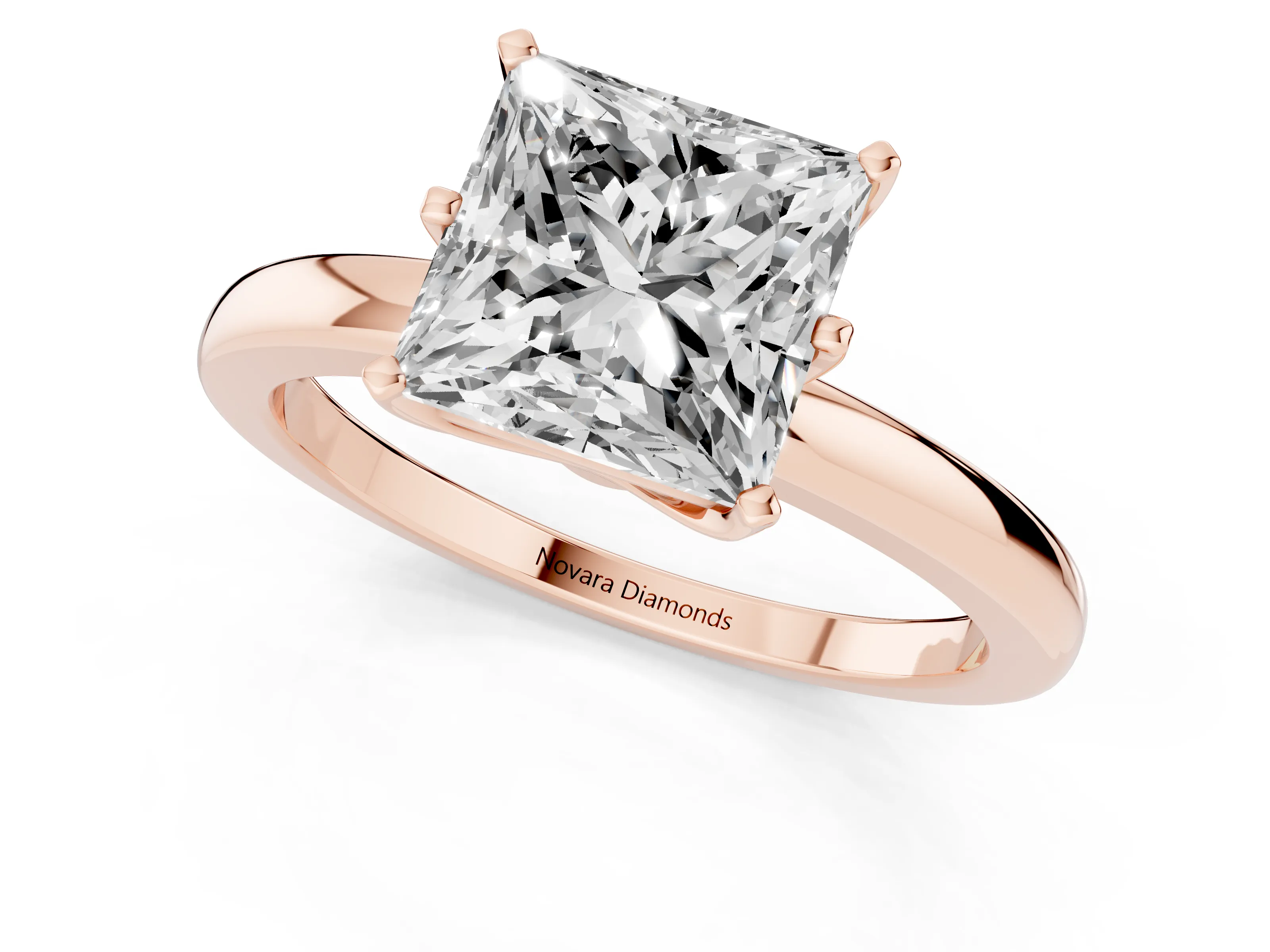 Princess Cut Diamond Solitaire Ring Set in Rose gold with Raised Prong Setting on a Classic Band