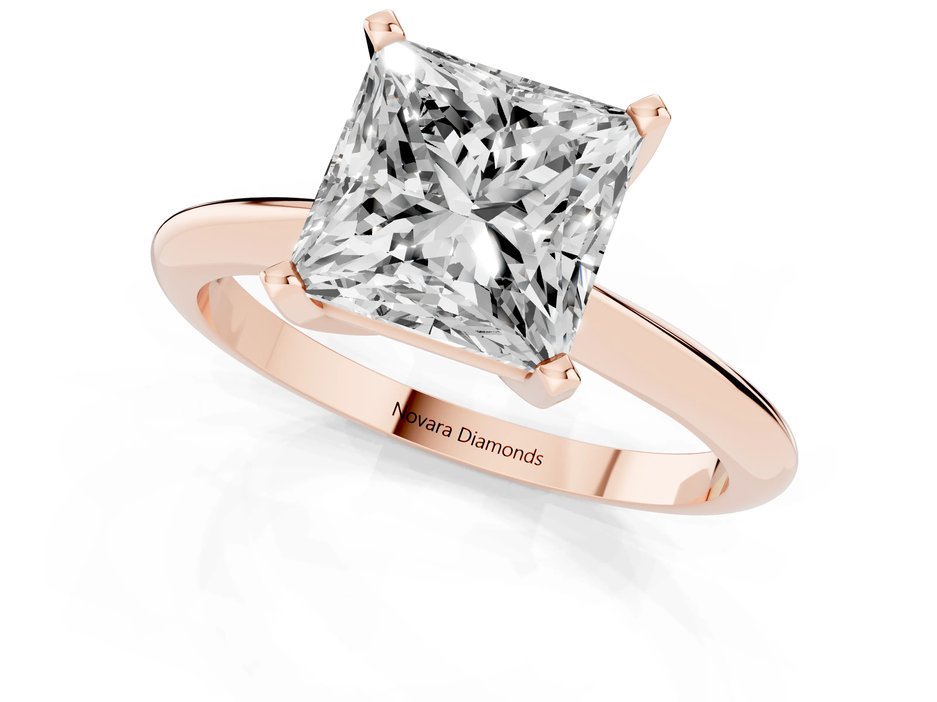 Princess Cut Diamond Solitaire Ring Set in Rose gold with Prong Setting on a Plain Round Band