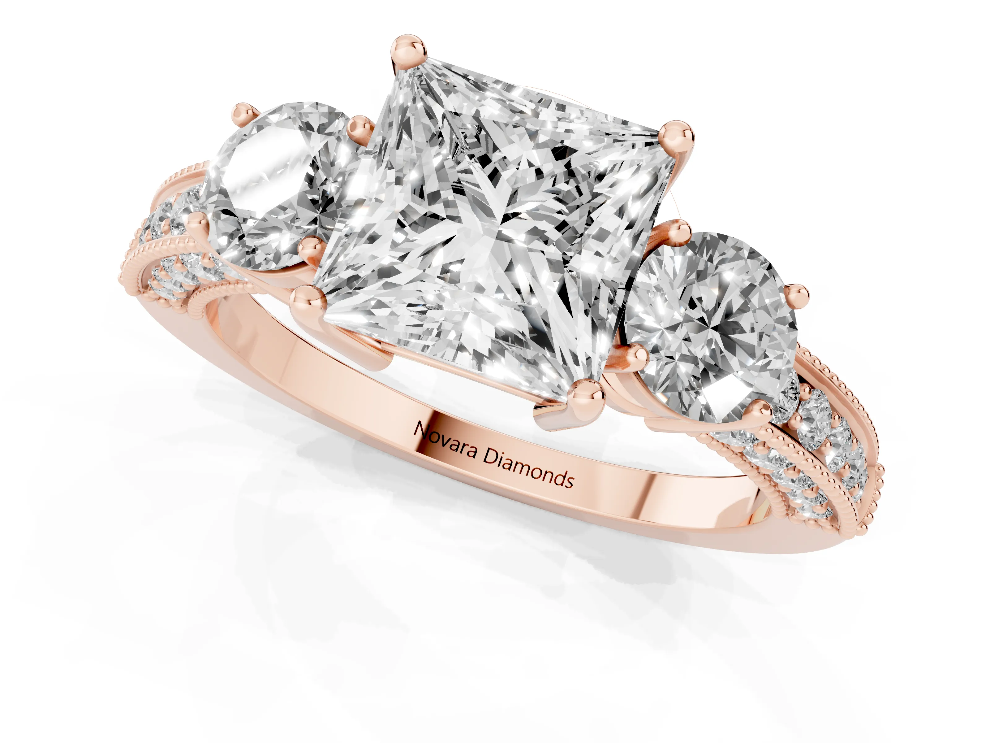 Princess Cut Diamond Three-Stone Ring Set in Rose gold with Round Side Stones and Pavé Band