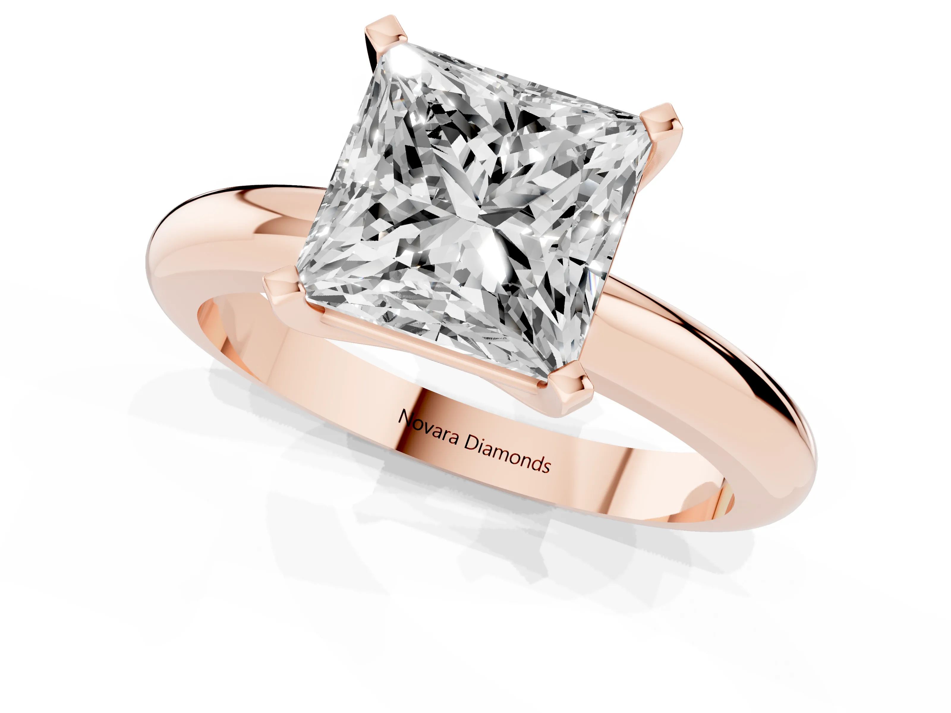 Princess Cut Diamond Solitaire Engagement Ring Set in Rose gold with Round Band and Prong Setting