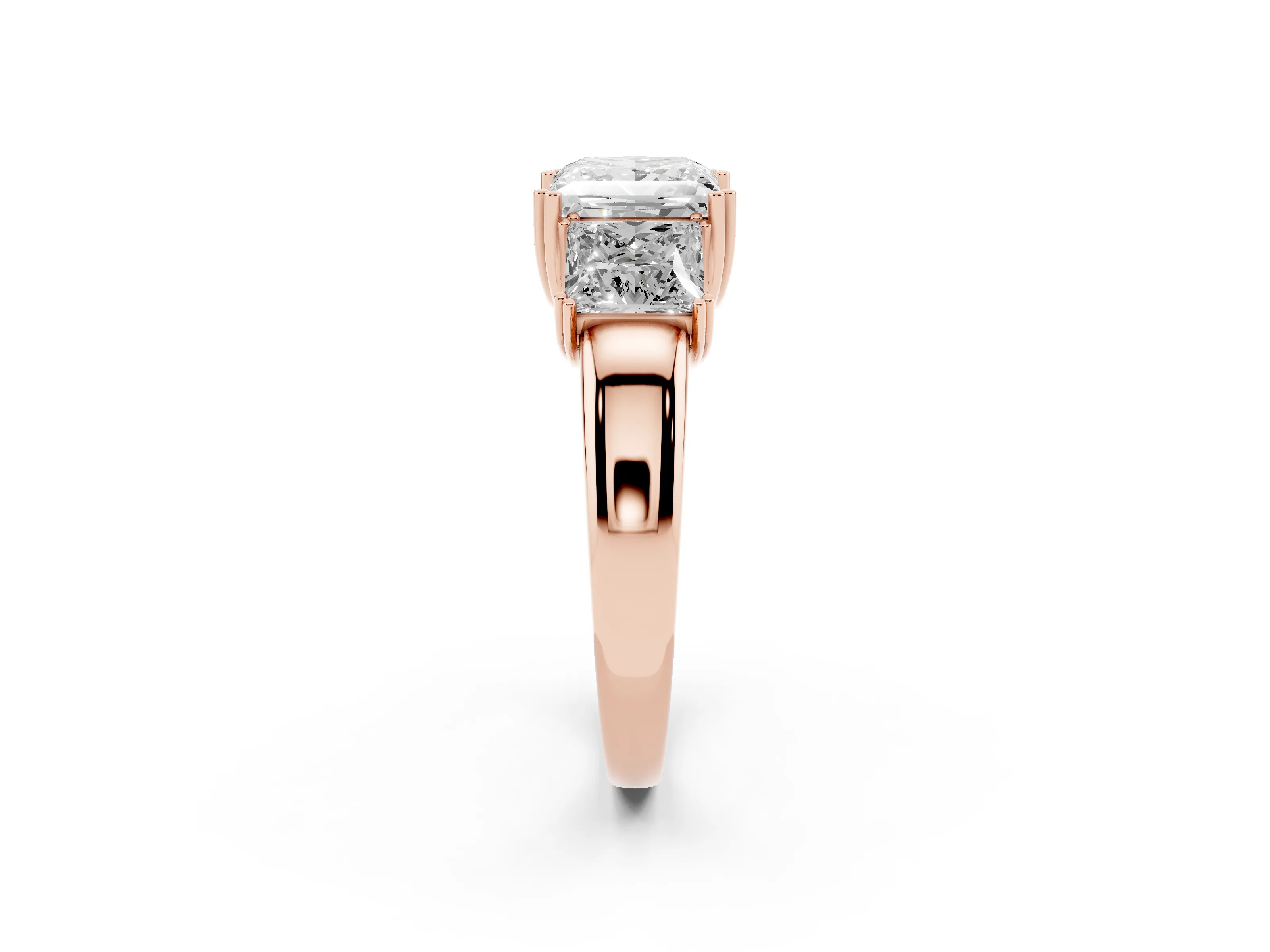 Princess Cut Diamond Three-Stone Ring Set in Rose gold with Polished Channel-Set Band
