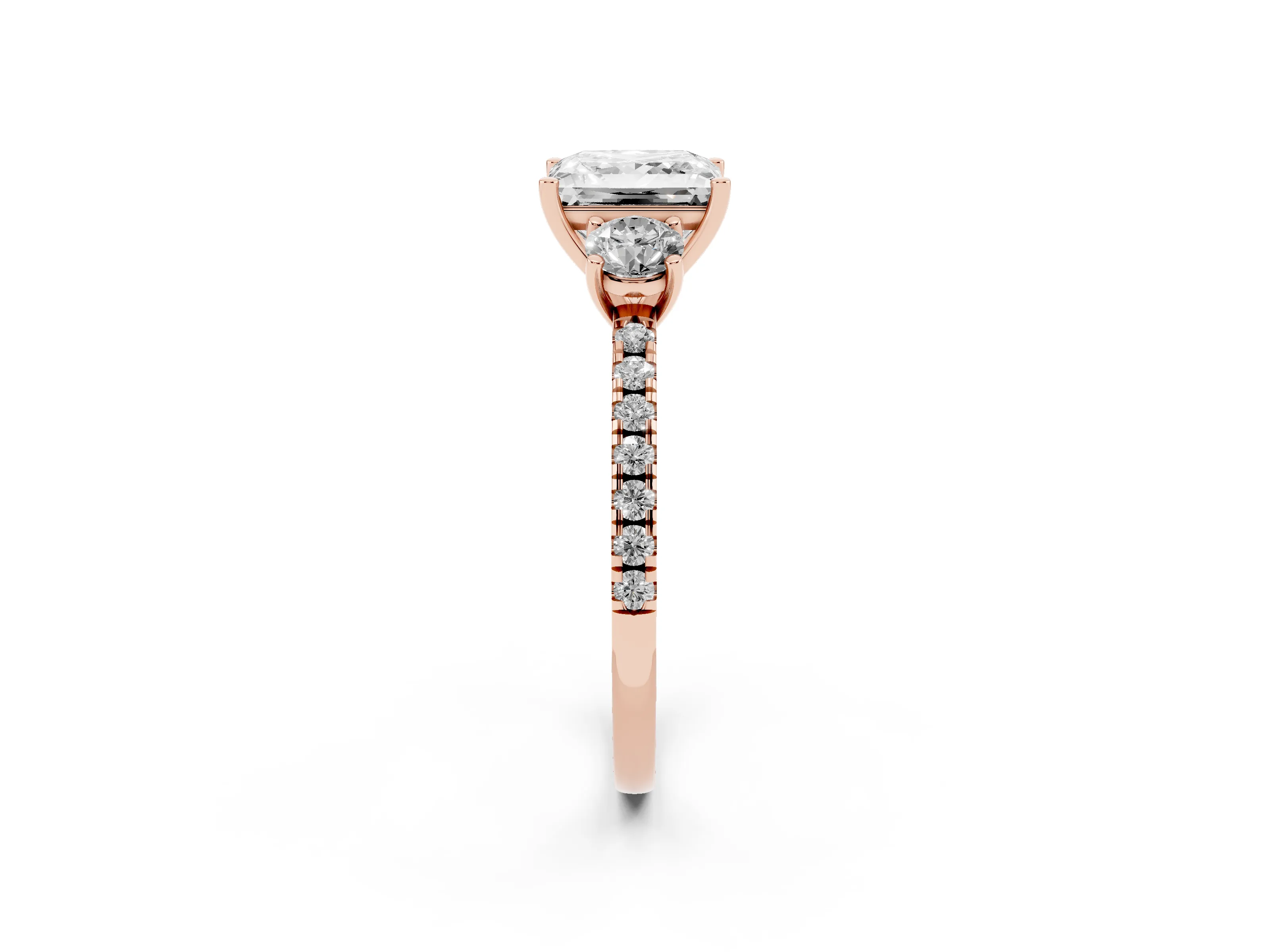 Princess Cut Diamond Three-Stone Ring Set in Rose gold with Pavé Band and Graduated Sides