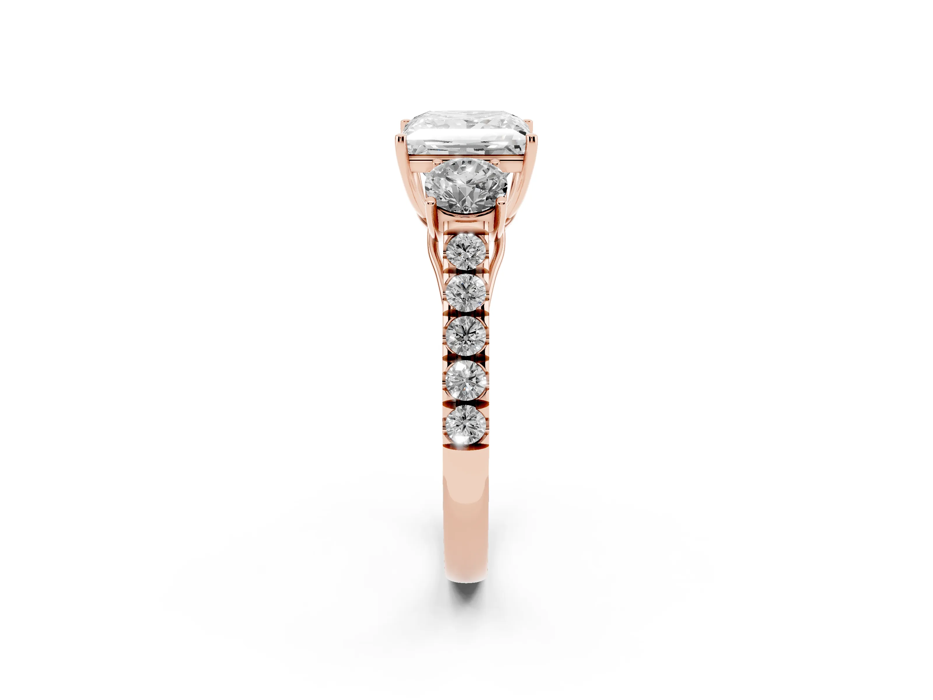 Princess Cut Diamond Three-Stone Ring Set in Rose gold with Round Side Stones and Delicate Pavé Band