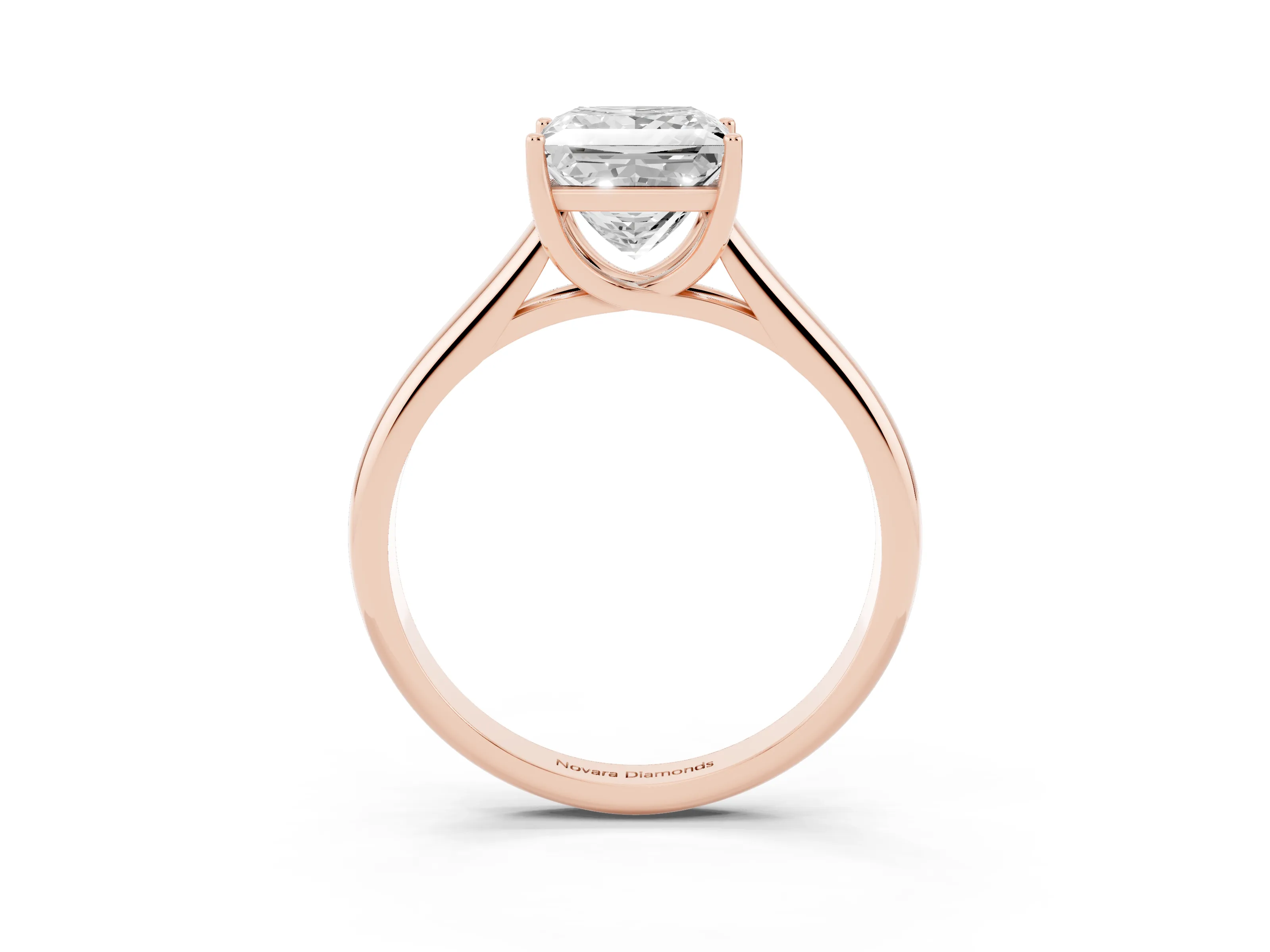 Princess Cut Diamond Solitaire Engagement Ring Set in Rose gold with Subtly Tapered Band and Prong Setting