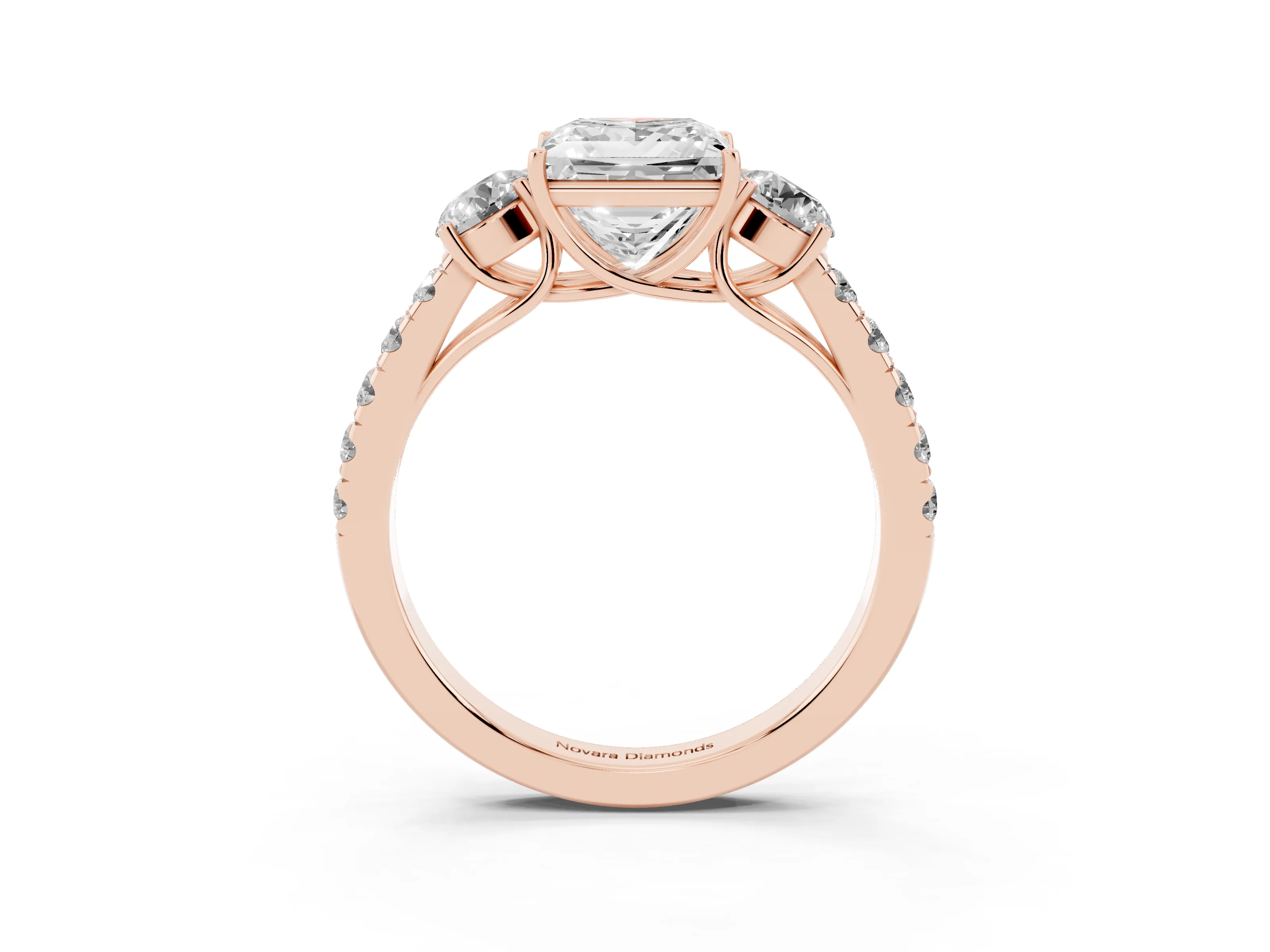 Princess Cut Diamond Three-Stone Ring Set in Rose gold with Round Side Stones and Delicate Pavé Band