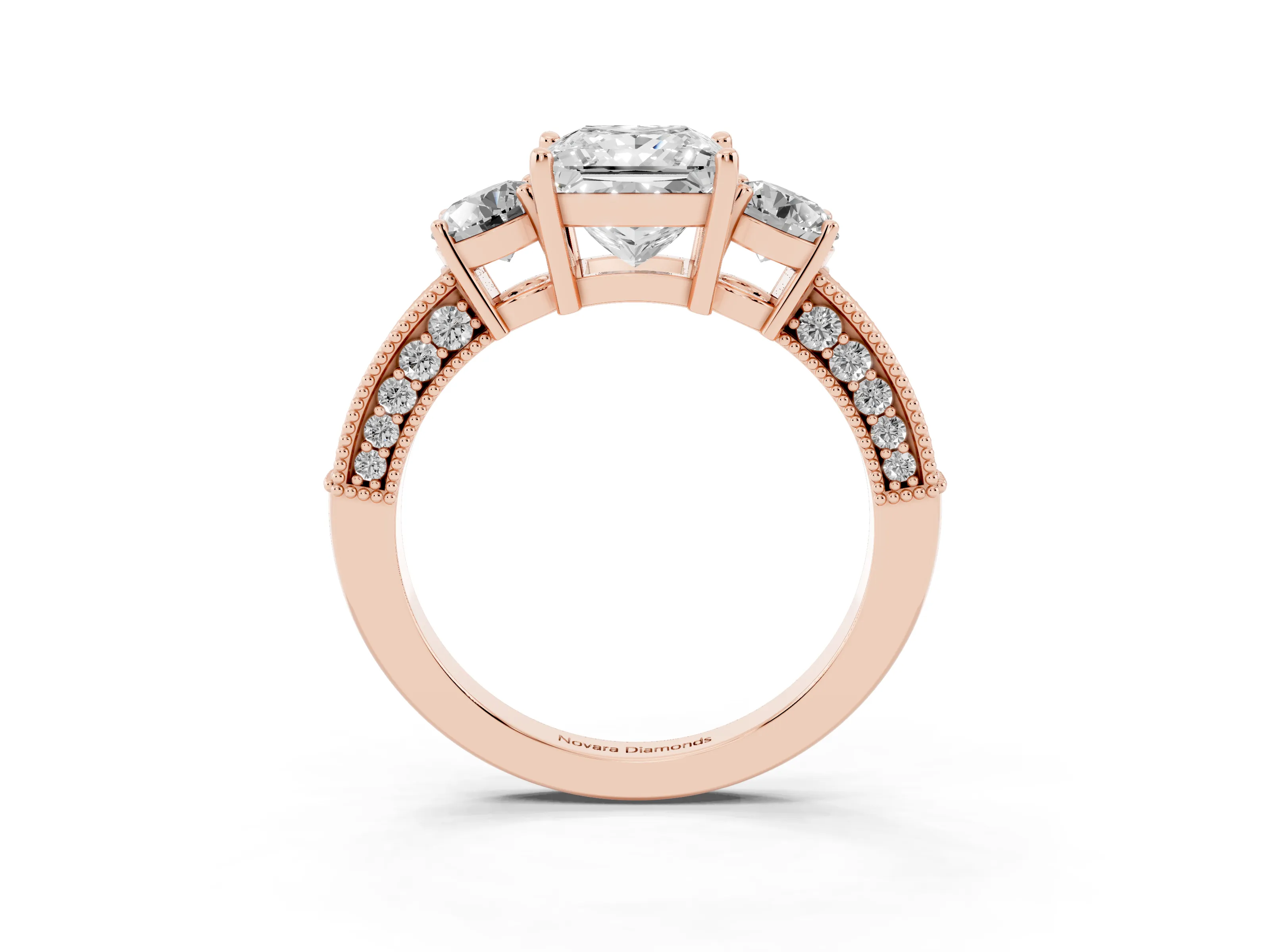 Princess Cut Diamond Three-Stone Ring Set in Rose gold with Round Side Stones and Pavé Band