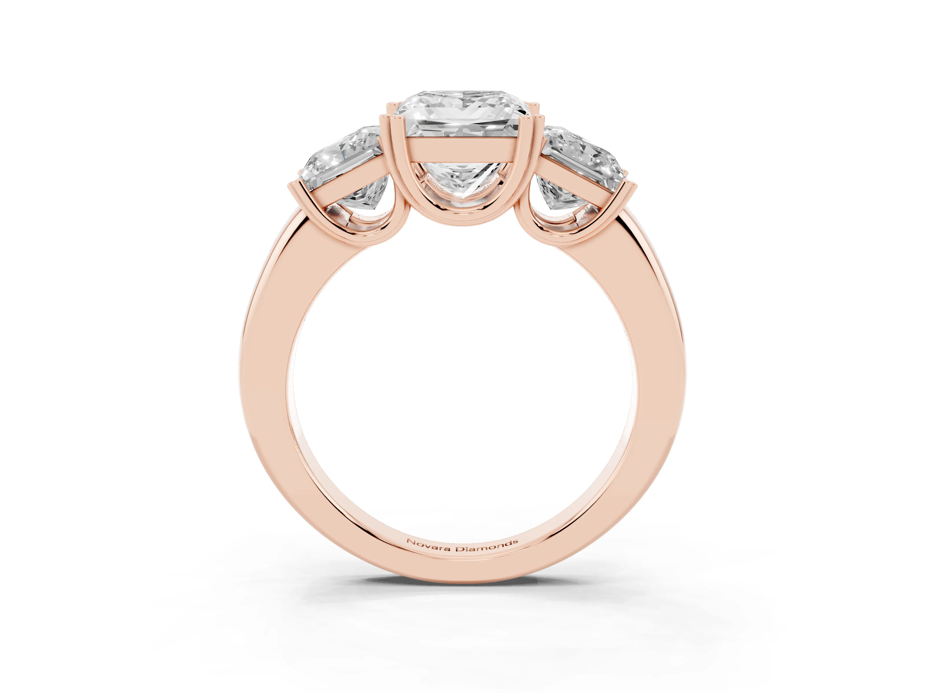 Princess Cut Diamond Three-Stone Ring Set in Rose gold with Polished Channel-Set Band