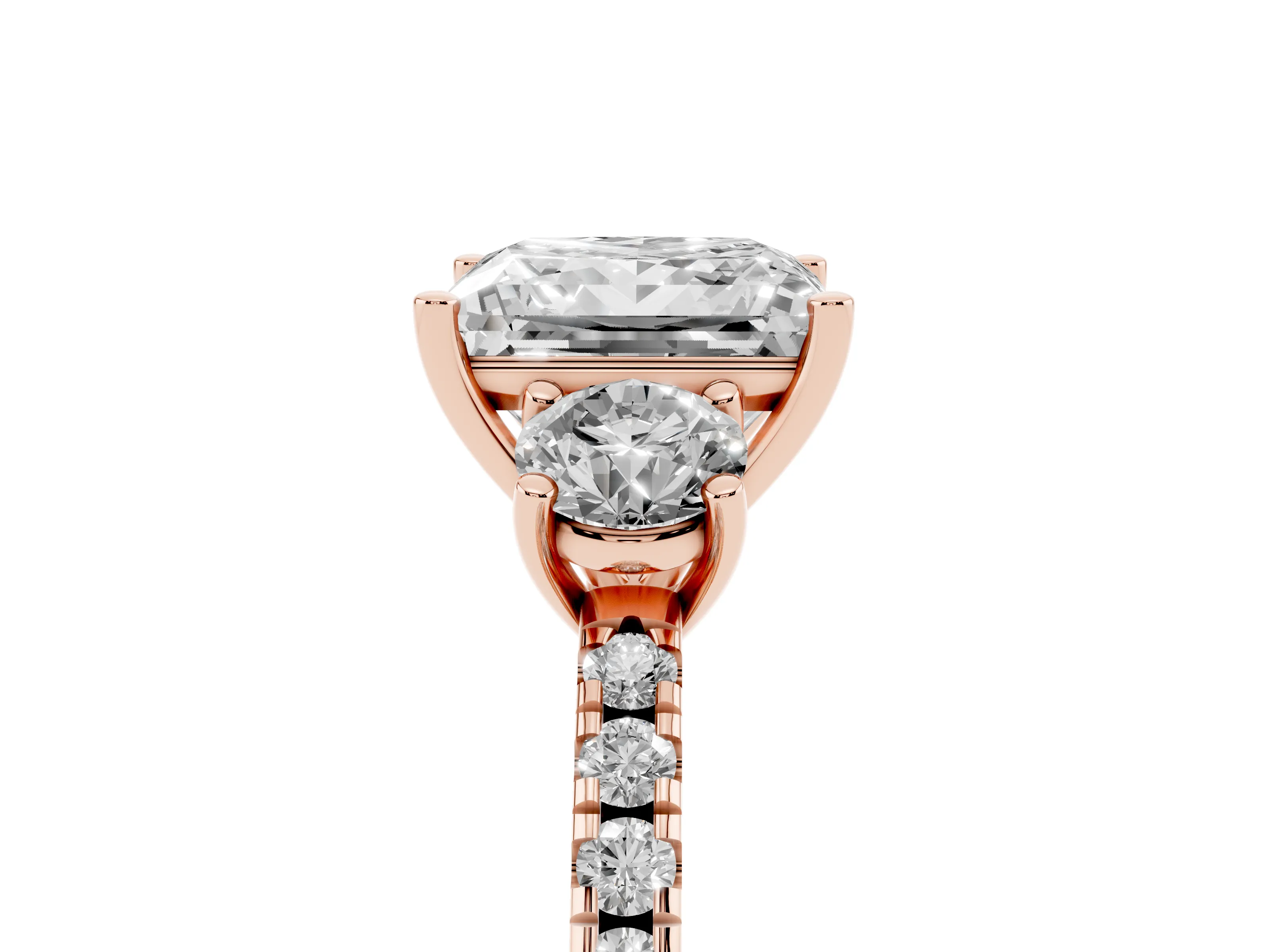 Princess Cut Diamond Three-Stone Ring Set in Rose gold with Pavé Band and Graduated Sides
