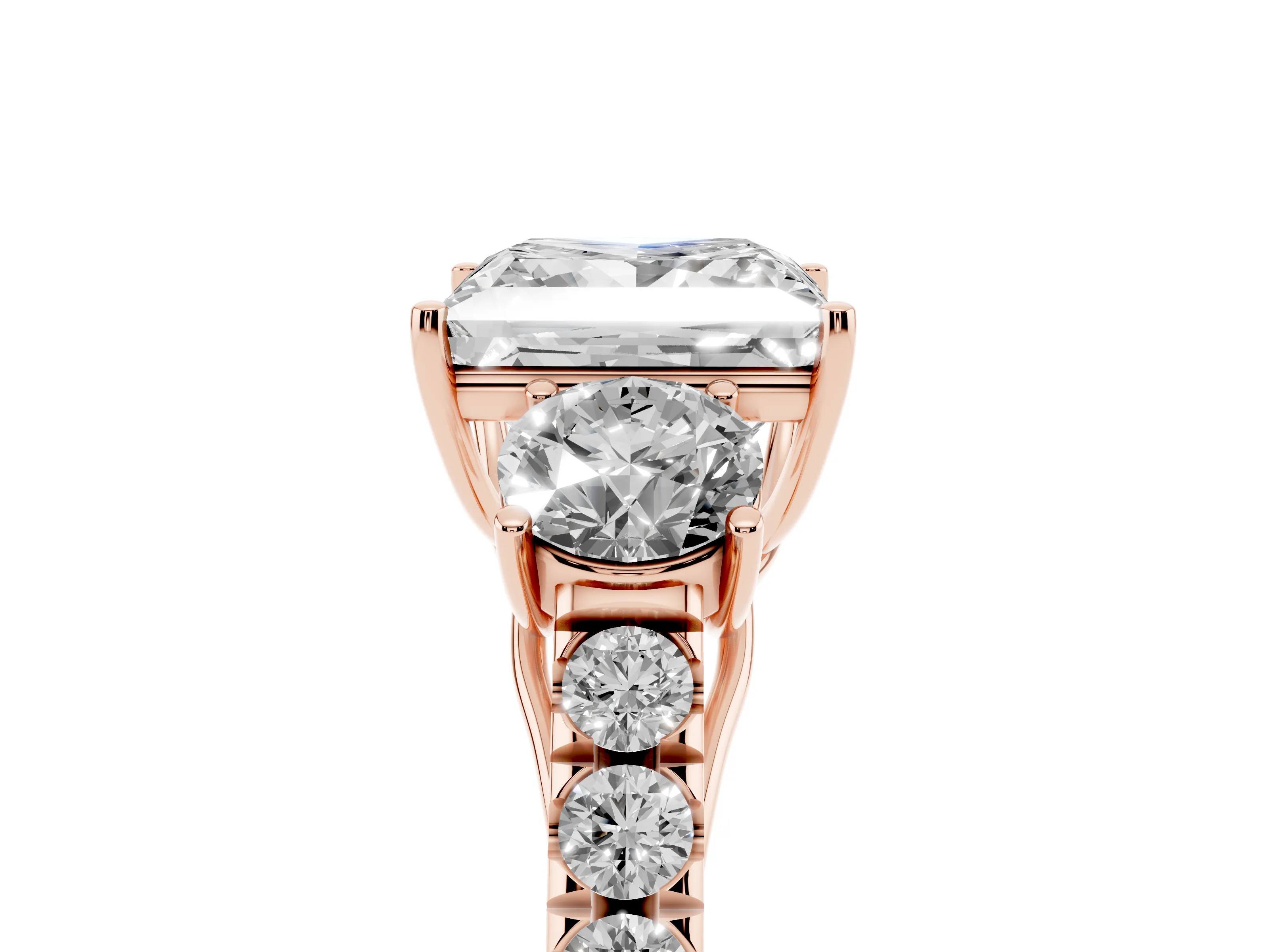 Princess Cut Diamond Three-Stone Ring Set in Rose gold with Round Side Stones and Delicate Pavé Band