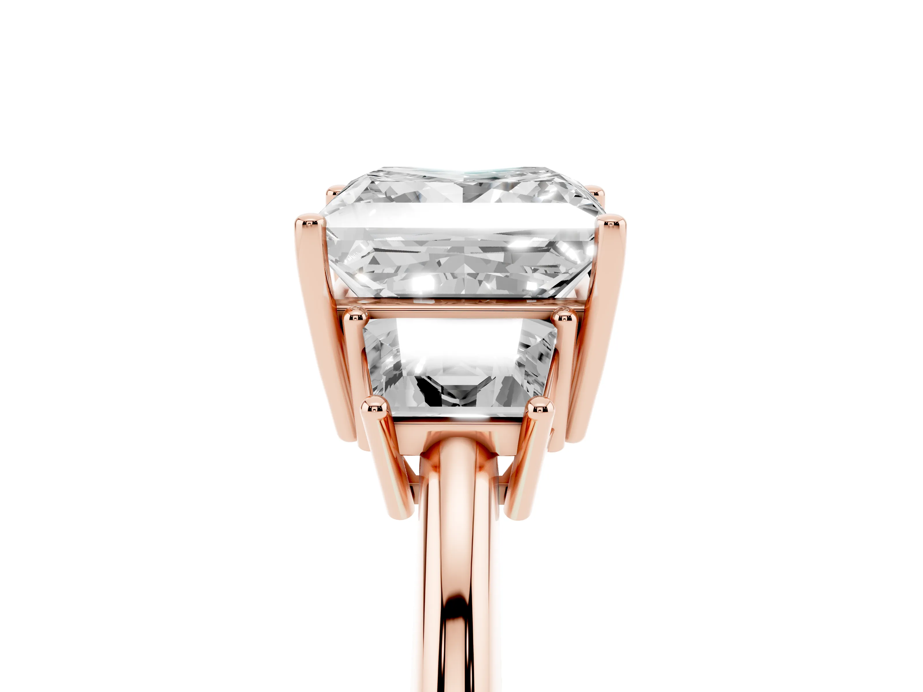 Princess Cut Diamond Three-Stone Ring Set in Rose gold with Trapezoid Side Stones and Prong Setting