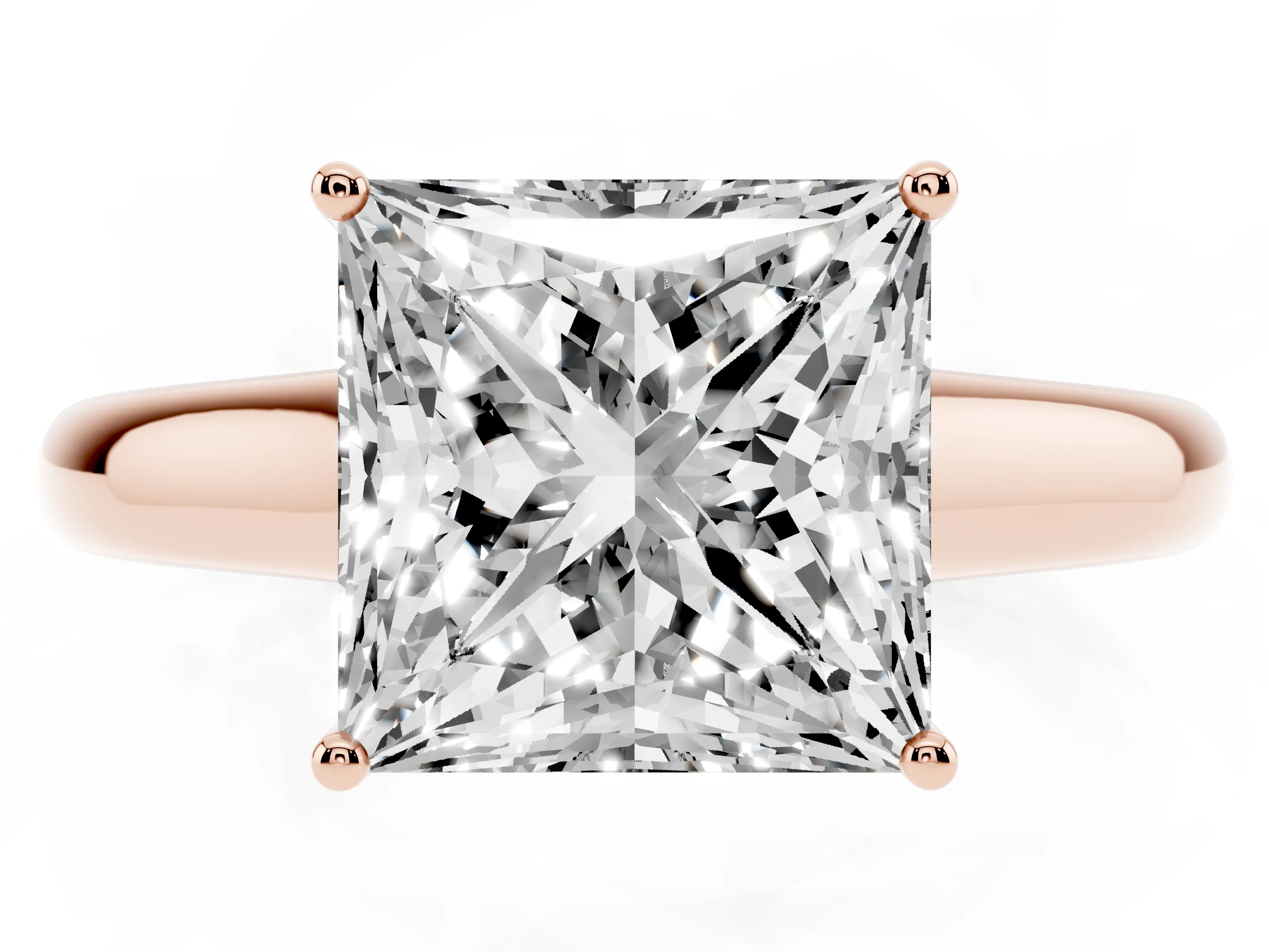 Princess Cut Diamond Solitaire Engagement Ring Set in Rose gold with Subtly Tapered Band and Prong Setting