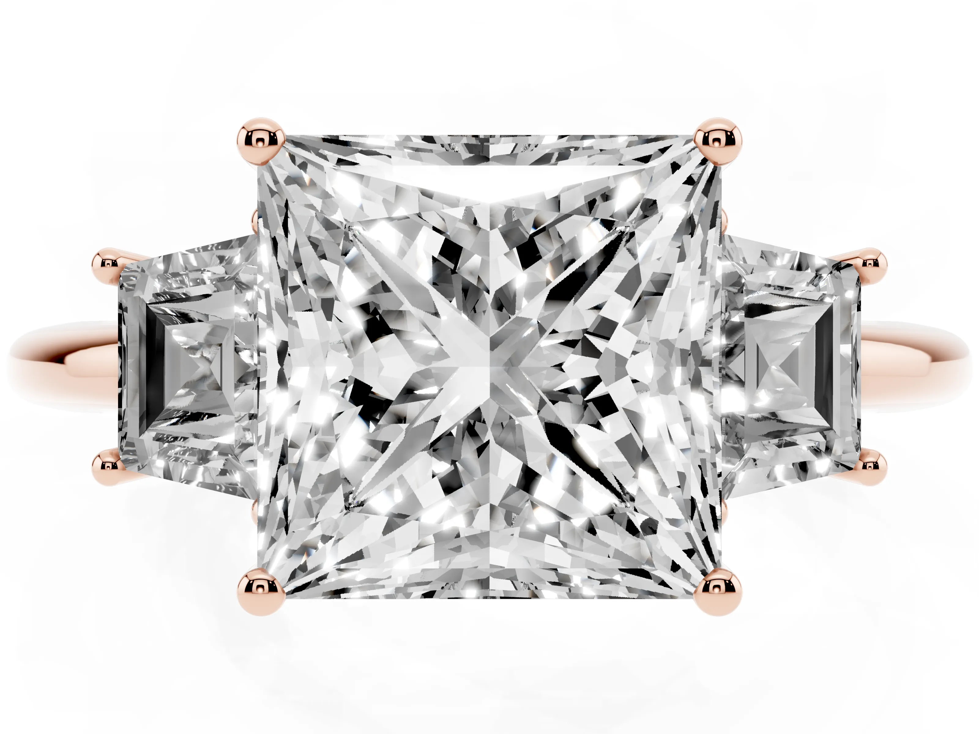 Princess Cut Diamond Three-Stone Ring Set in Rose gold with Trapezoid Side Stones and Prong Setting