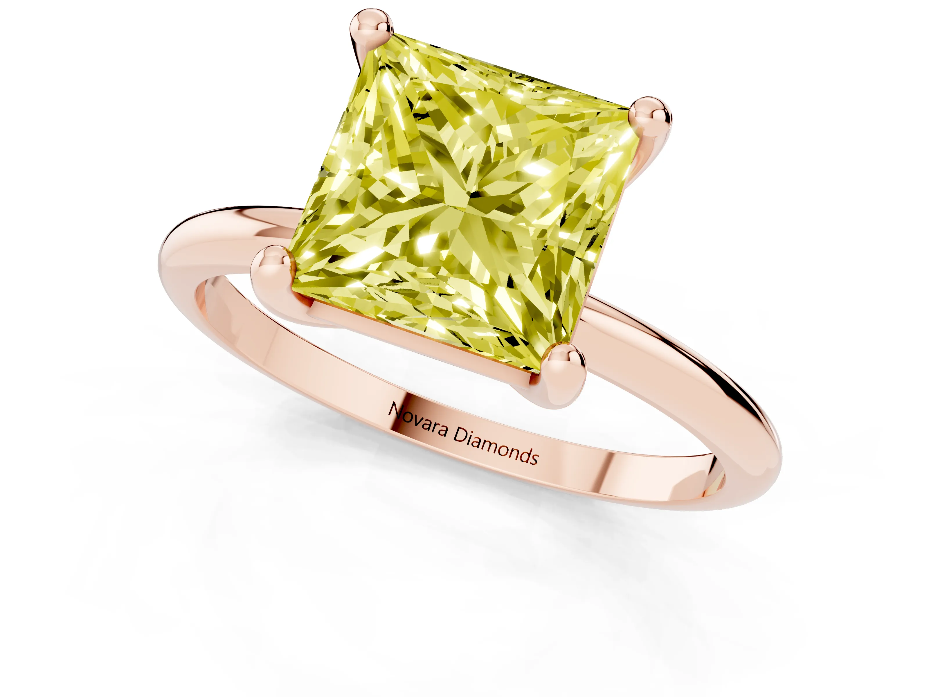 Fancy Yellow Princess Cut Diamond Solitaire Ring Set in Rose gold with Secure Prong Setting on a Classic Band
