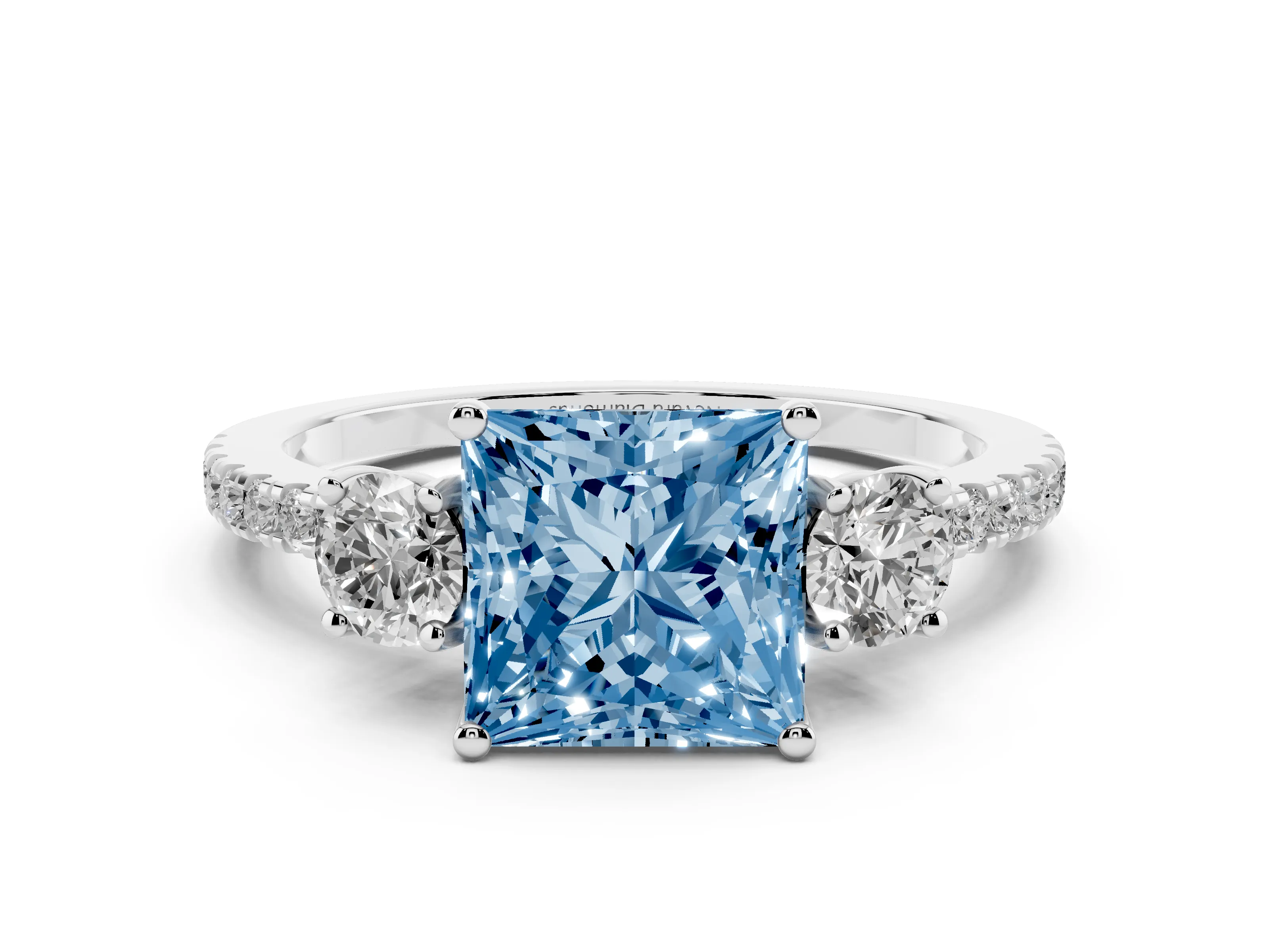 Fancy Blue Princess Cut Diamond Three-Stone Ring Set in White gold with Pavé Band and Graduated Sides