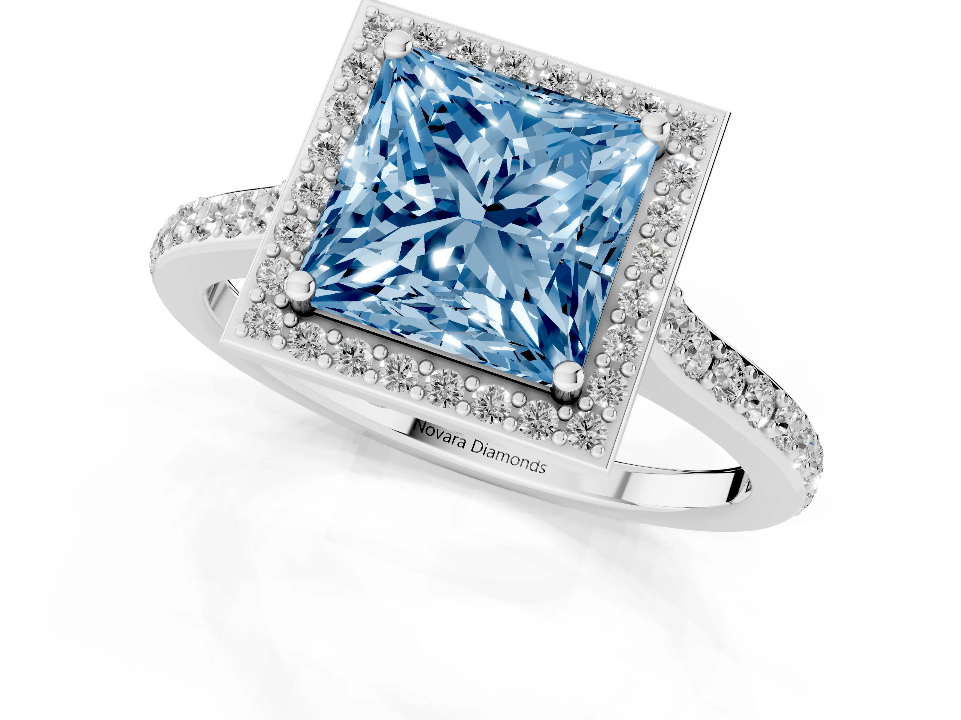 Fancy Blue Princess Cut Diamond Halo Engagement Ring Set in White gold with Round Pavé Shoulders and Heart Gallery