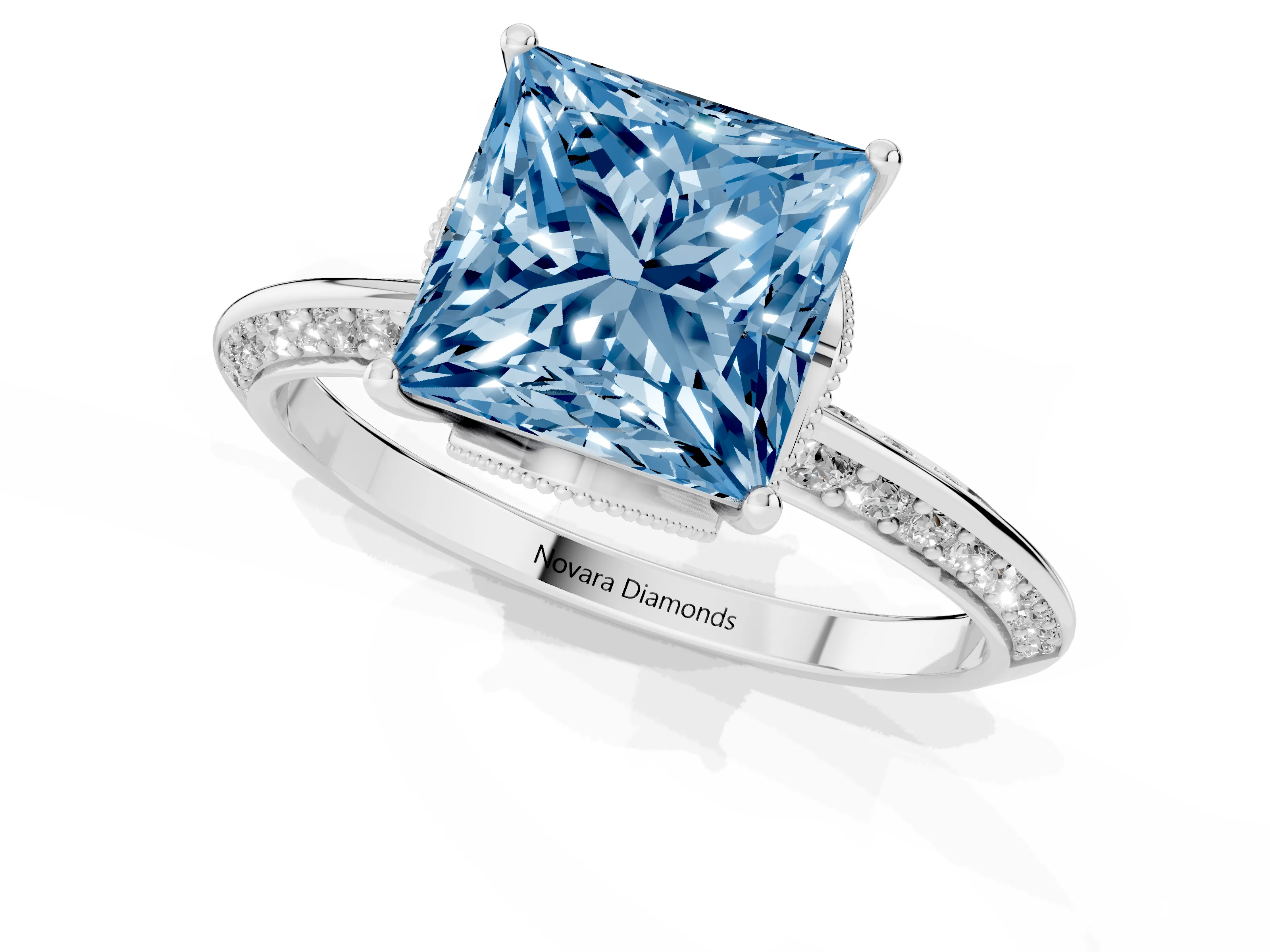 Fancy Blue Princess Cut Diamond Solitaire Engagement Ring Set in White gold with Pavé Split Shank and Prong Setting