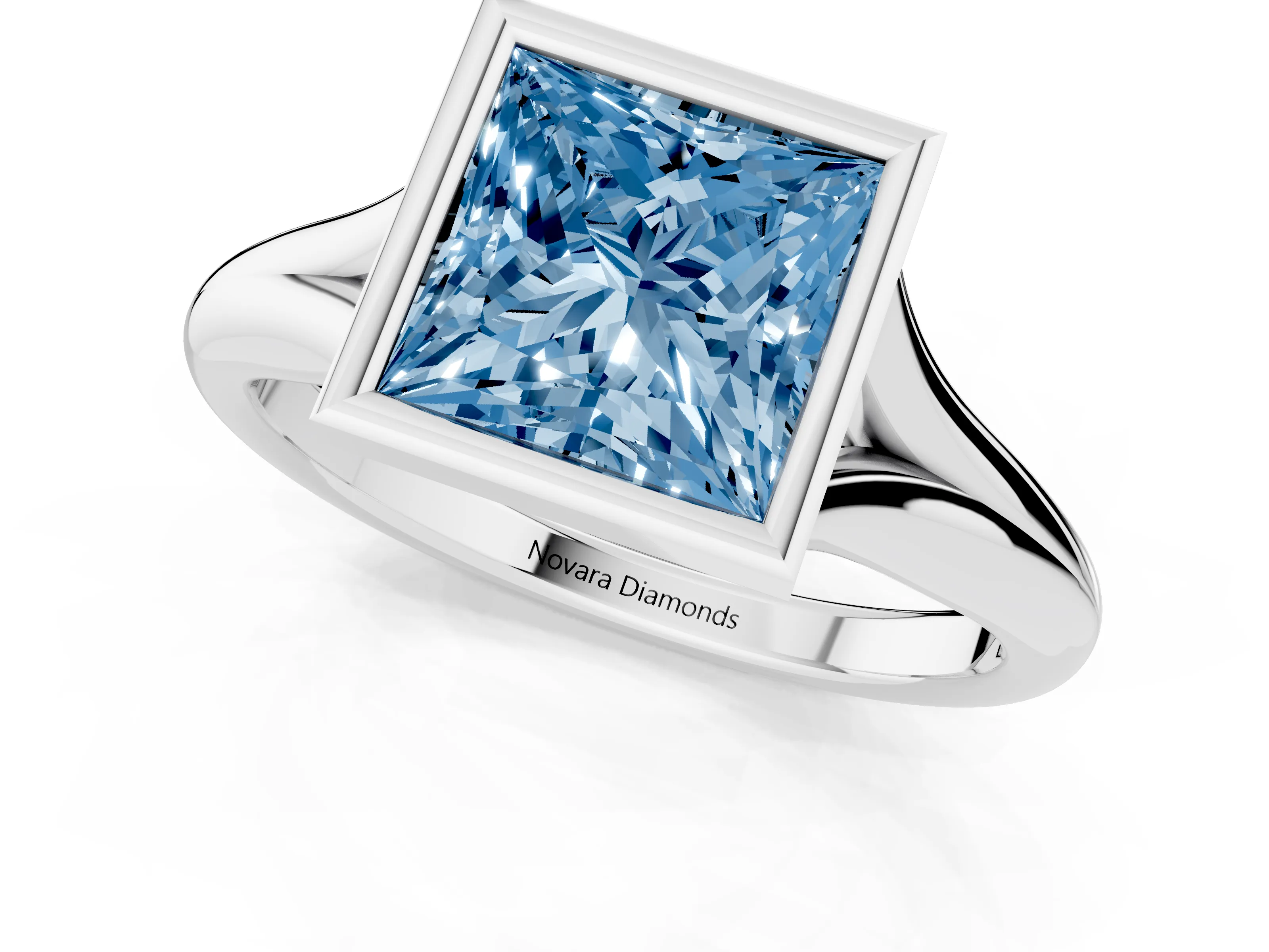 Fancy Blue Bezel Set Princess Cut Diamond Solitaire Ring Set in White gold with Smooth Band