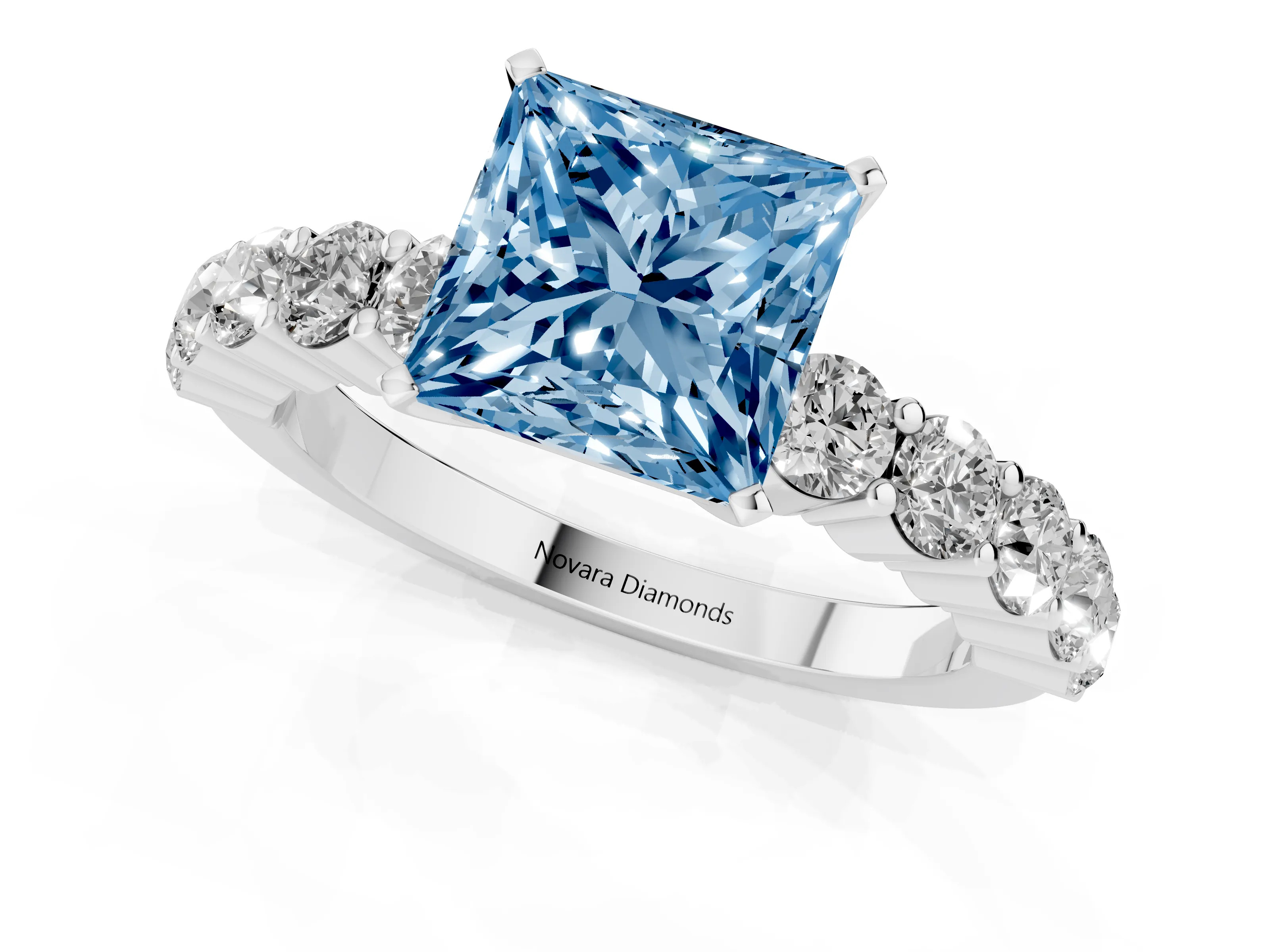 Fancy Blue Princess Cut Diamond Solitaire Ring Set in White gold with Shared Prong Round Side Stones