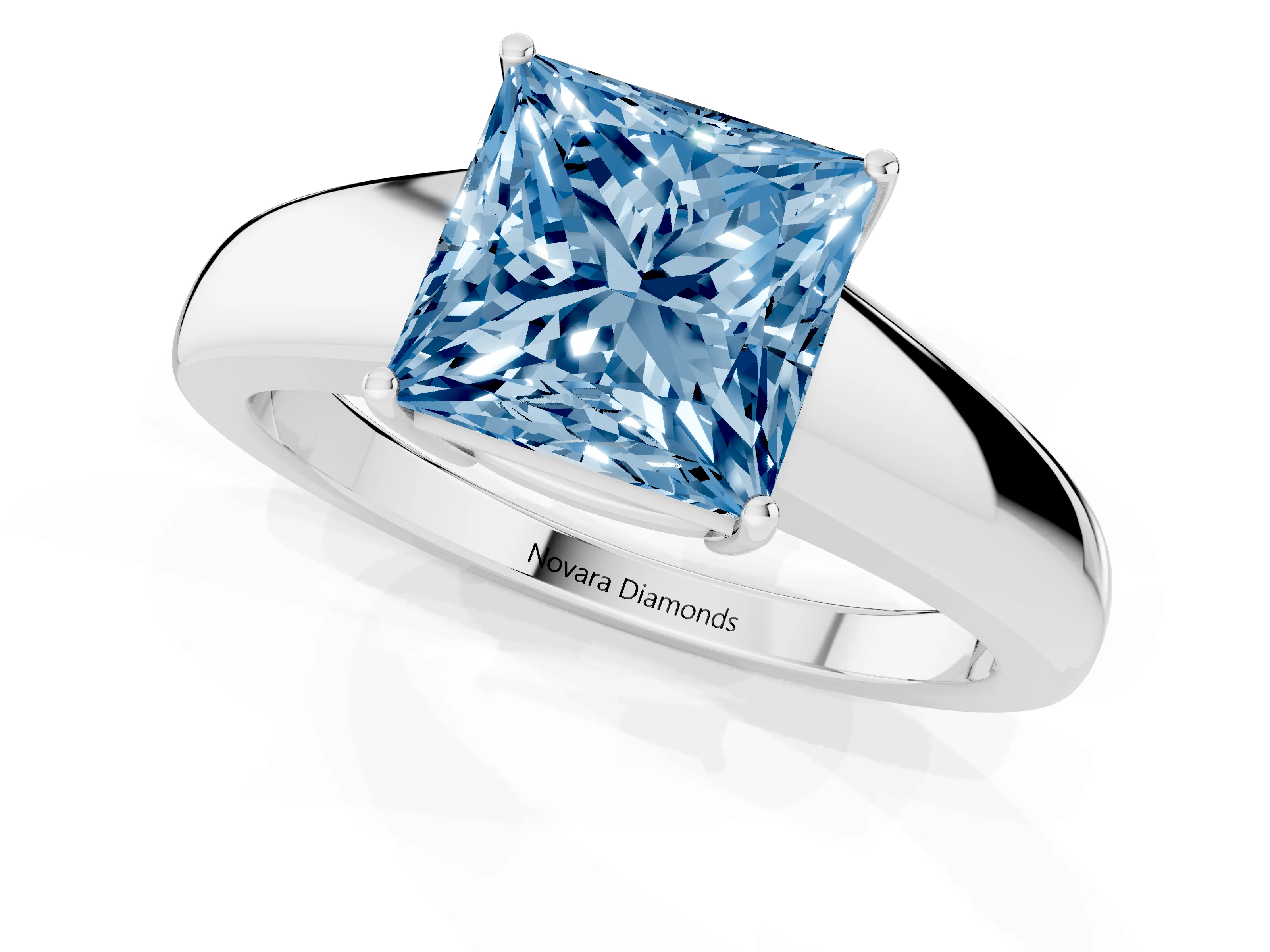Fancy Blue Princess Cut Diamond Solitaire Ring Set in Silver with Tapered Band and Prong Setting