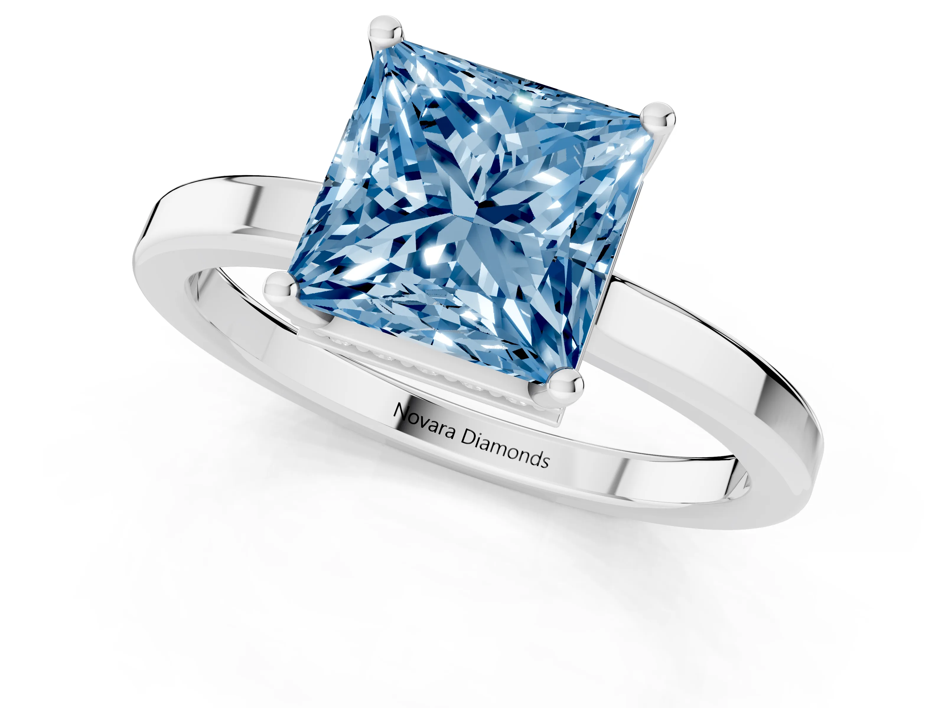 Fancy Blue Princess Cut Diamond Solitaire Engagement Ring Set in Platinum with Prong Setting on a Plain Band