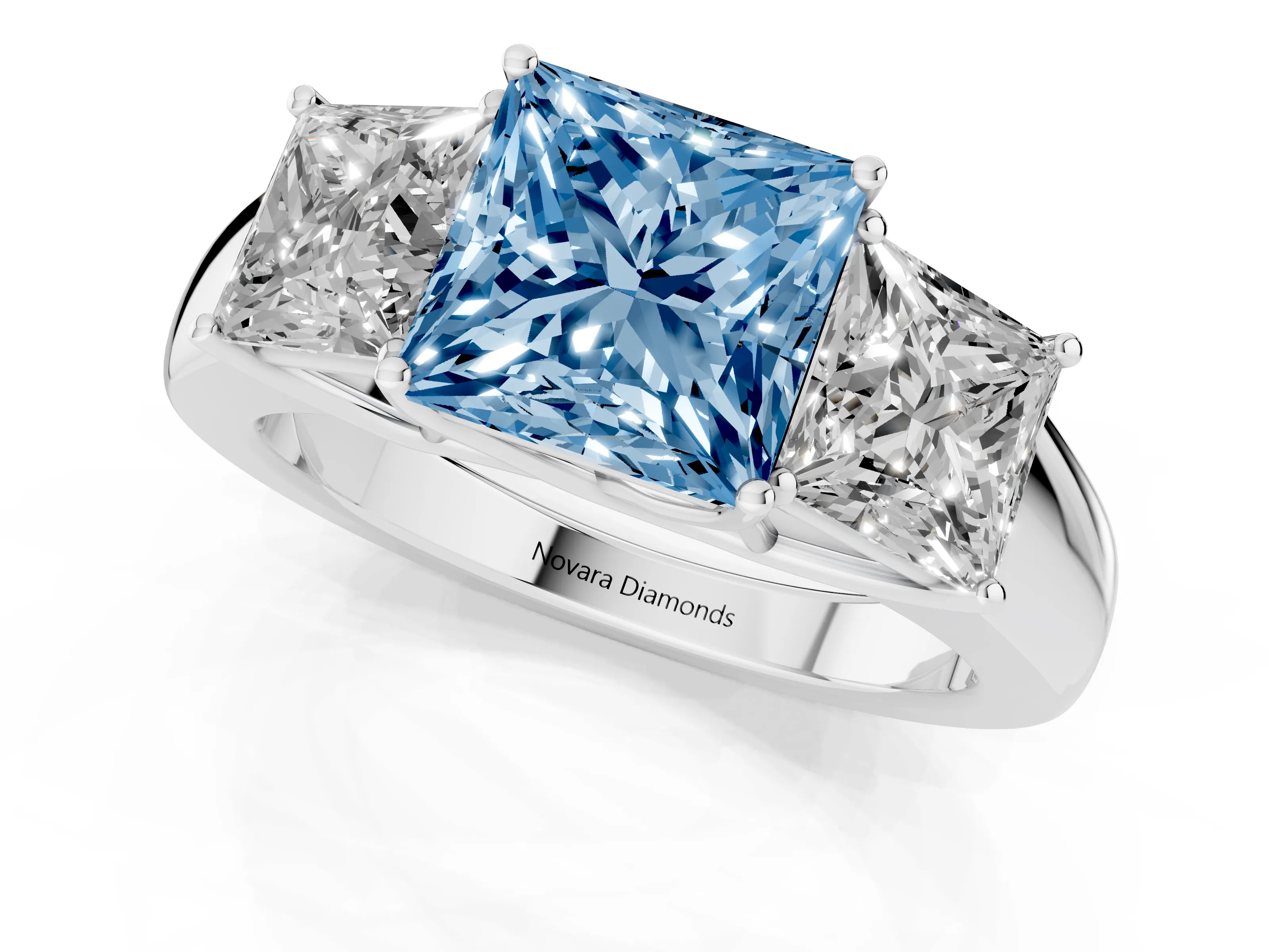 Fancy Blue Three-Stone Princess Cut Diamond Ring Set in Platinum with Matching Prong Settings and Plain Band