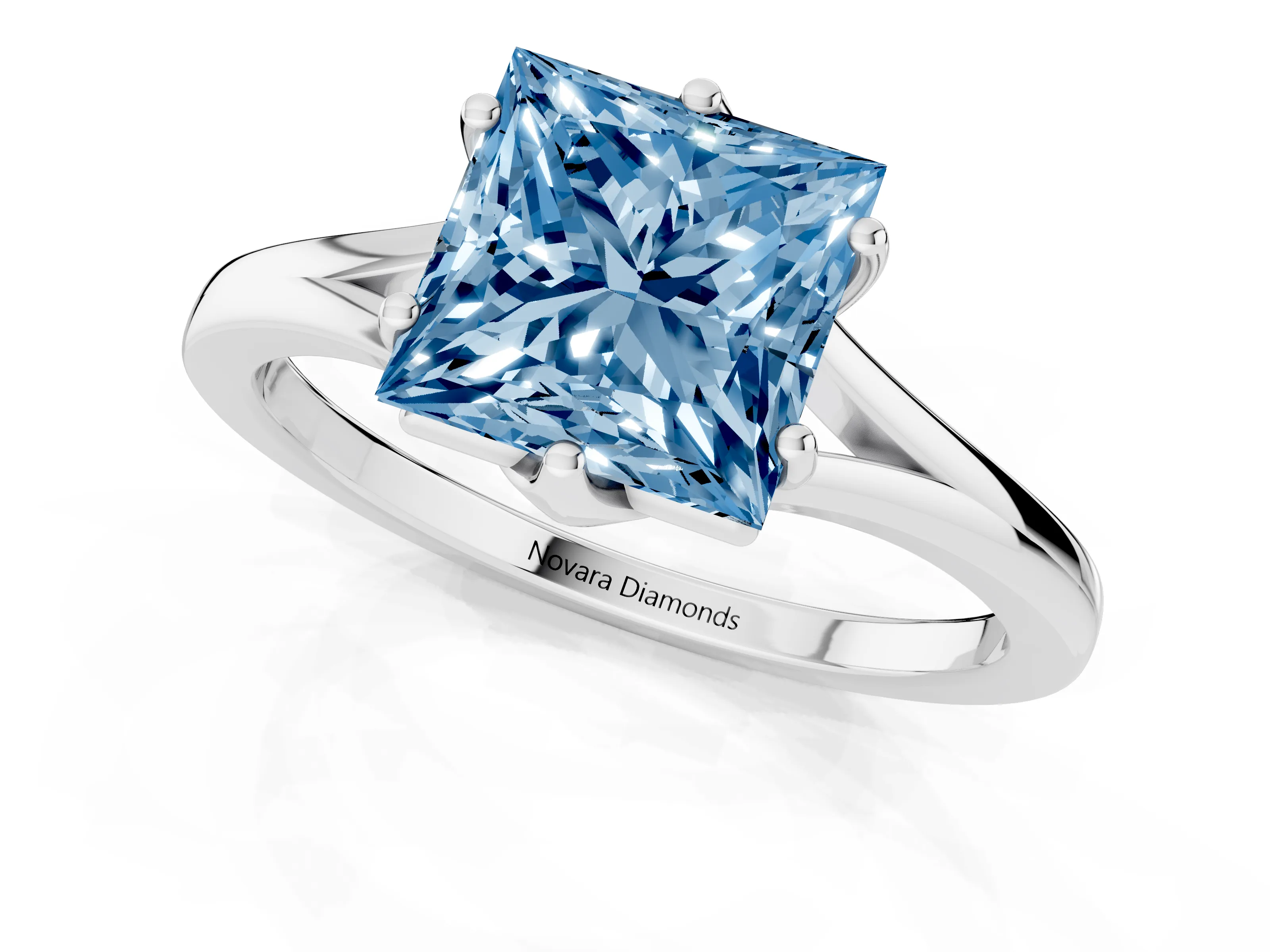 Fancy Blue Princess Cut Diamond Solitaire Ring Set in Silver with Polished Tapered Band and Prong Setting
