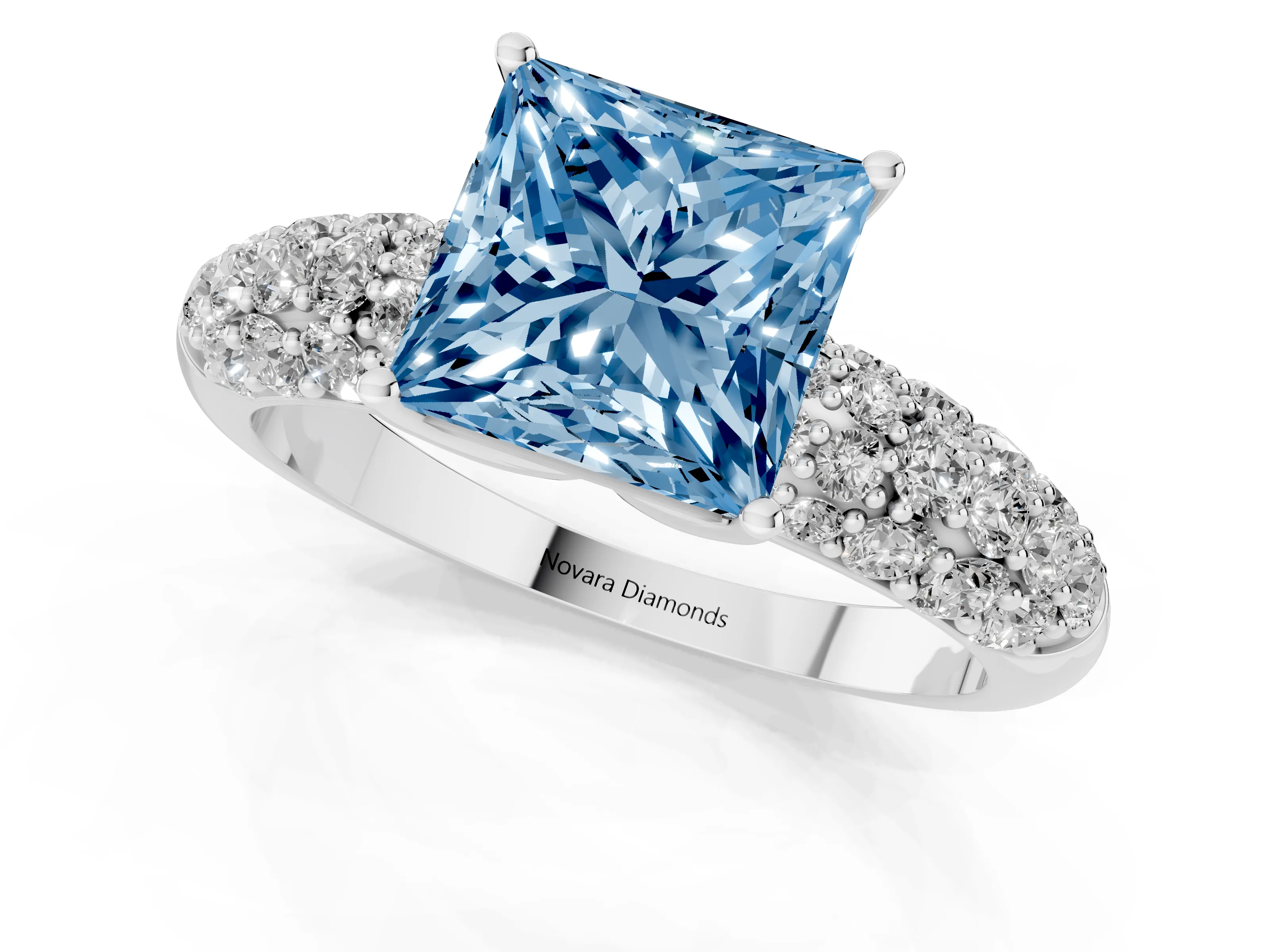 Fancy Blue Princess Cut Diamond Pavé Band Solitaire Ring Set in White gold with Close-Set Accent Stones and Prong Setting