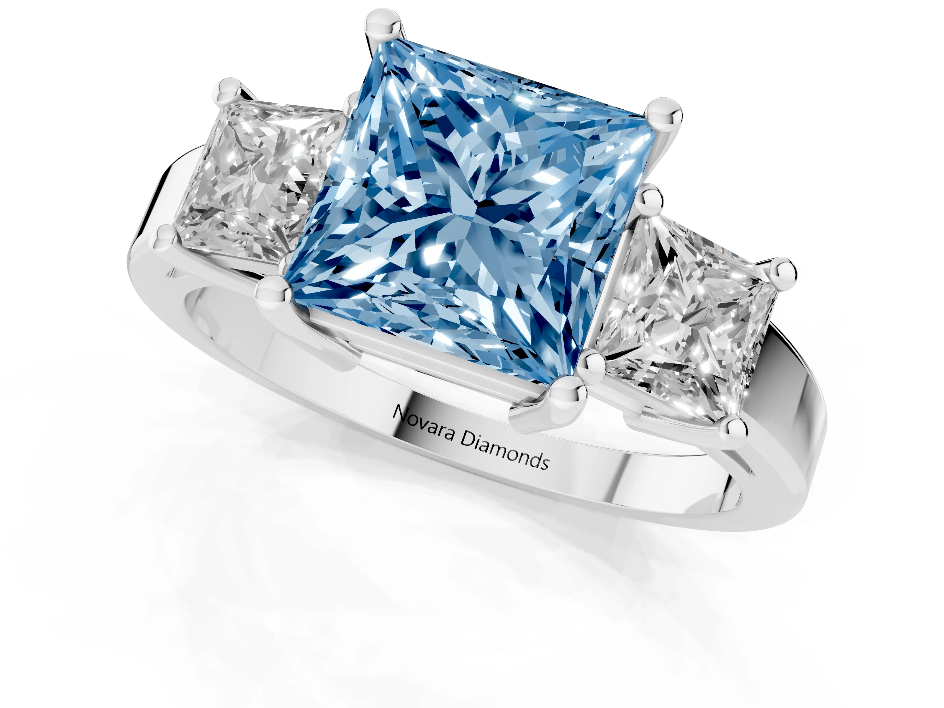 Fancy Blue Three-Stone Princess Cut Diamond Solitaire Ring Set in Platinum with Prong Setting