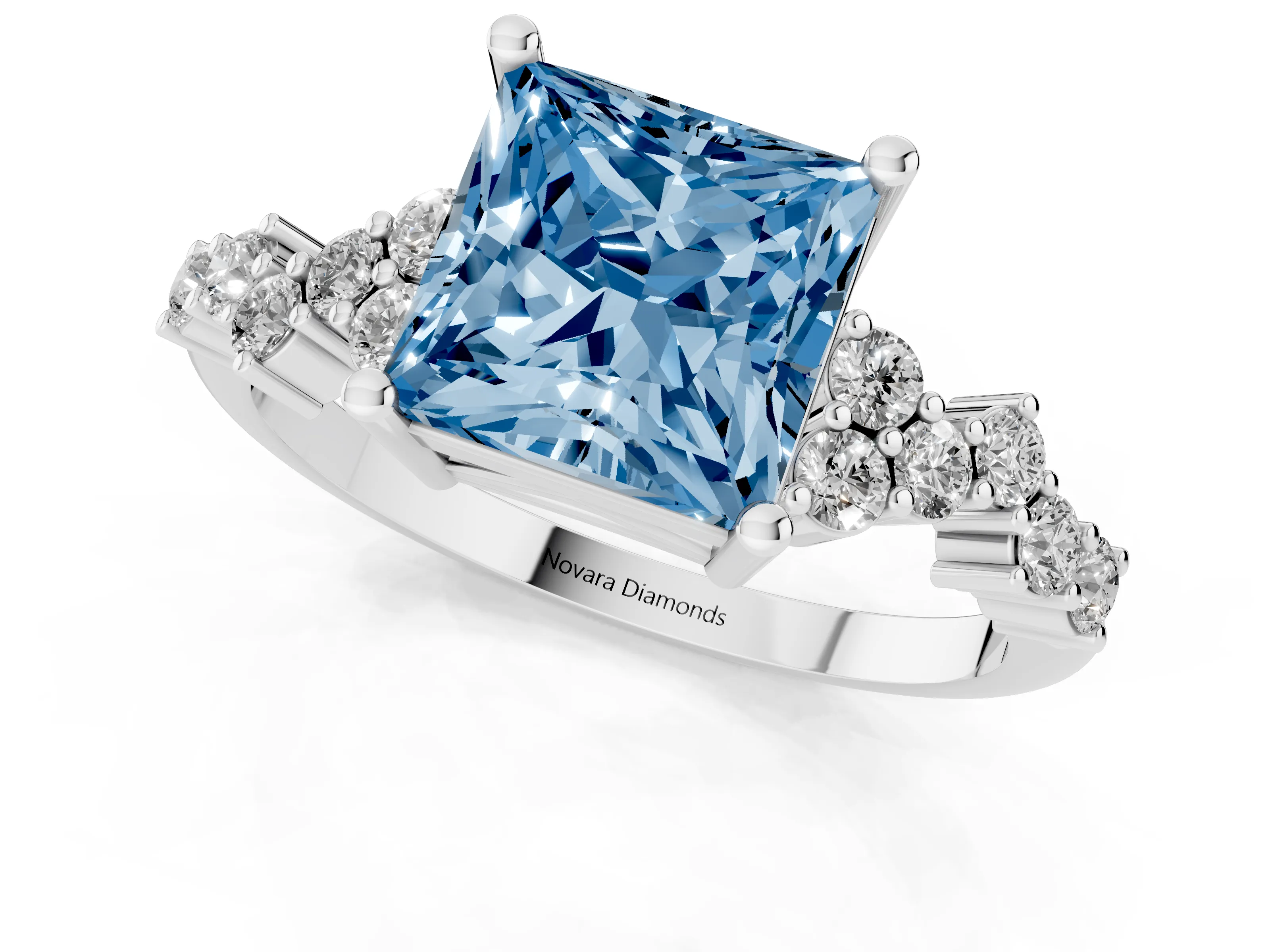 Fancy Blue Princess Cut Diamond Ring Set in White gold with Scattered Round Accents