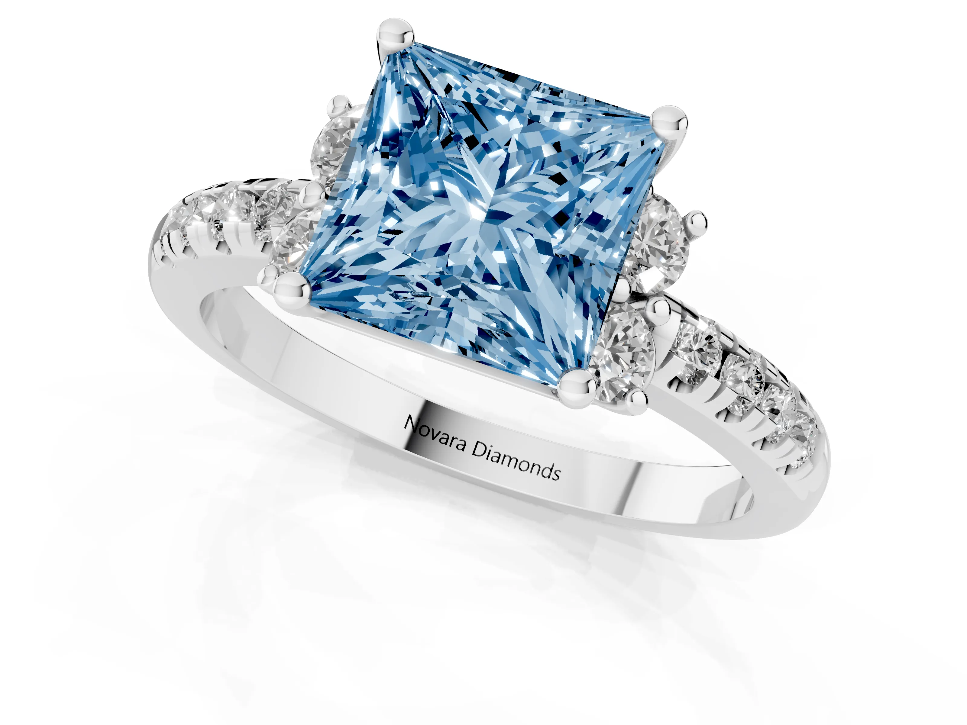 Fancy Blue Princess Cut Diamond Three-Stone Pavé Ring Set in White gold with Prong Setting