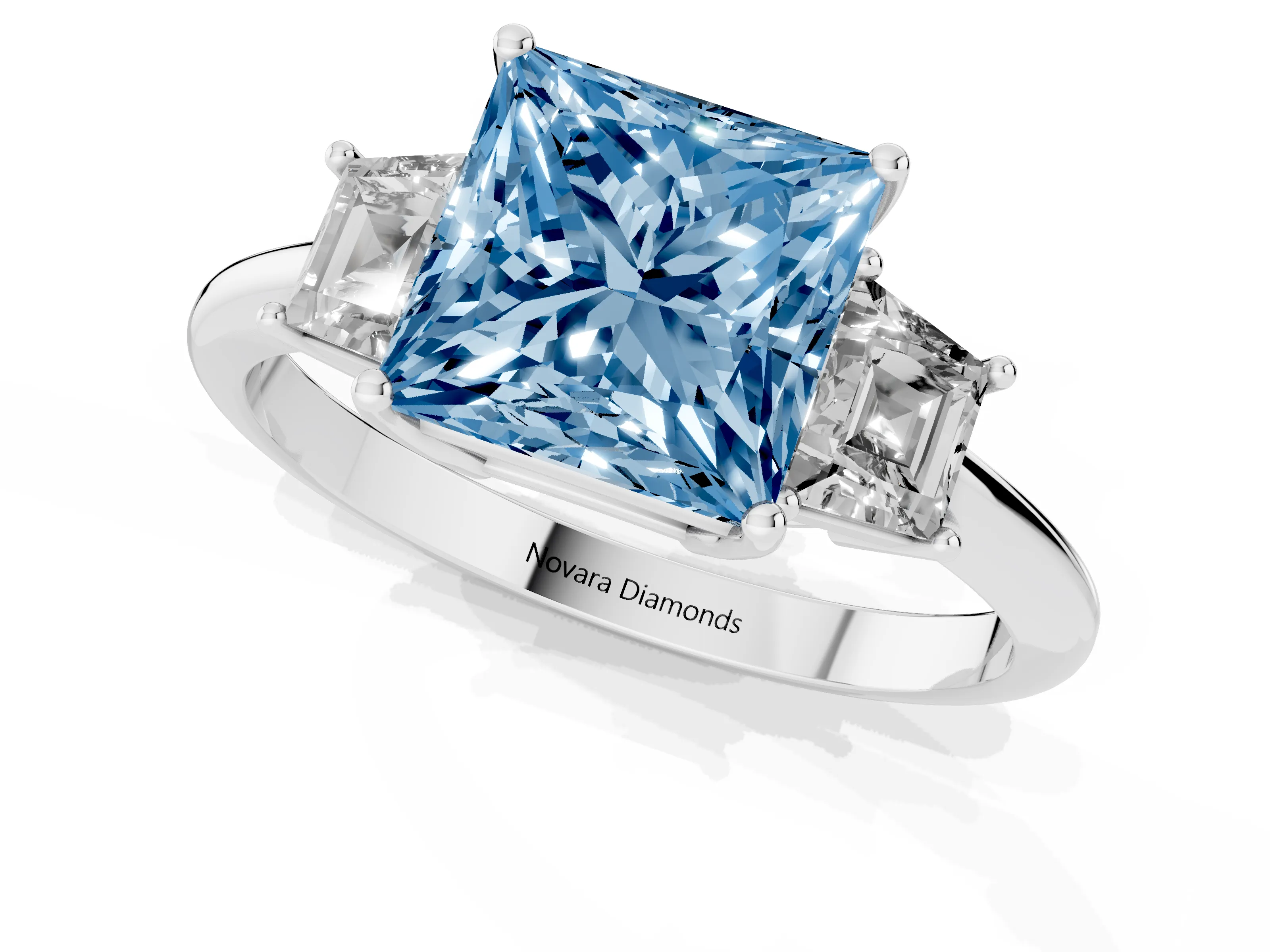 Fancy Blue Princess Cut Diamond Three-Stone Ring Set in Silver with Trapezoid Side Stones and Prong Setting
